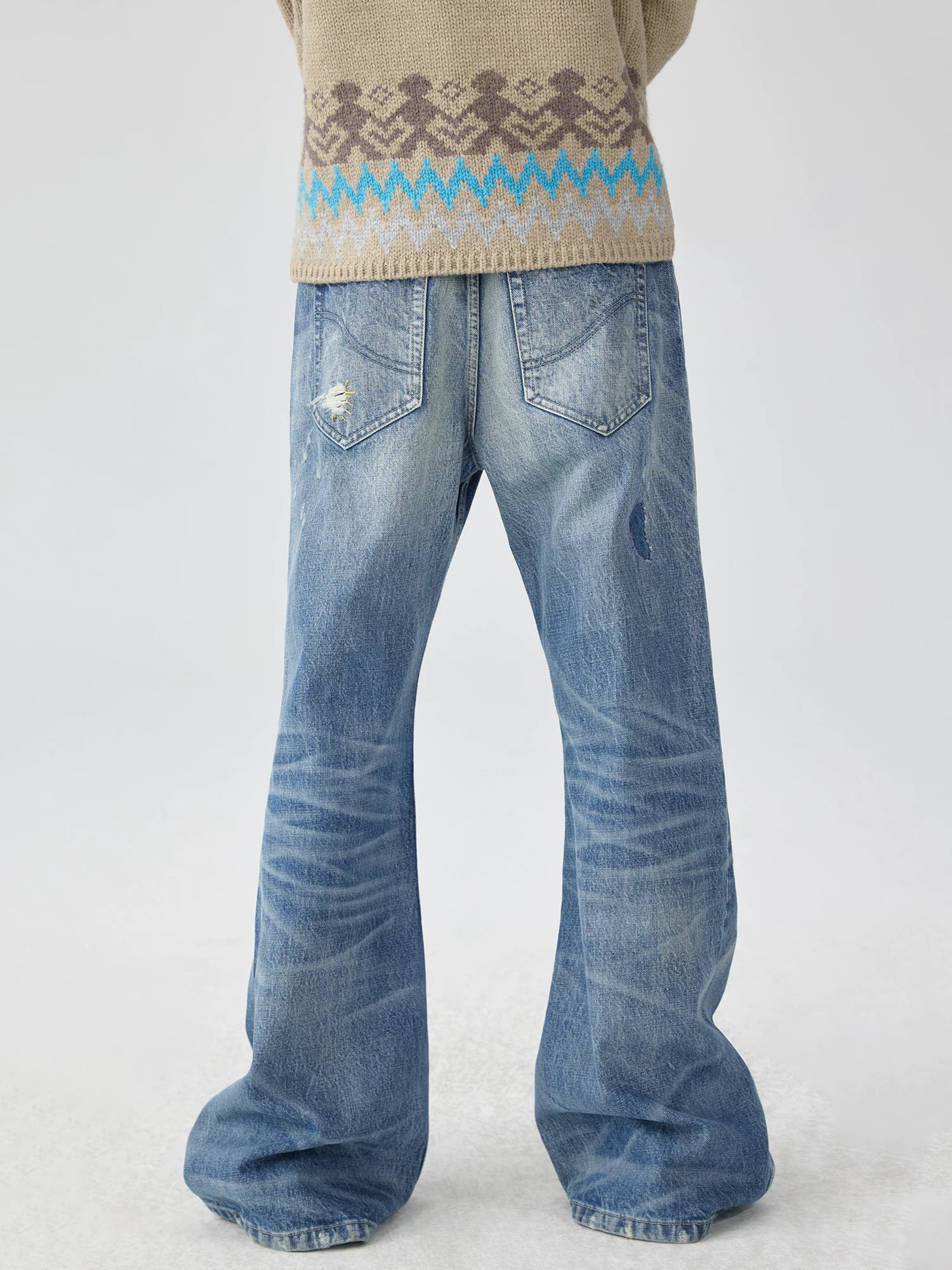 Distressed Patchwork Flared Jeans