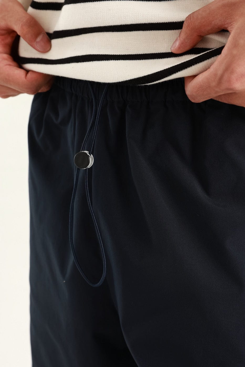 Pantalones atléticos a rayas laterales