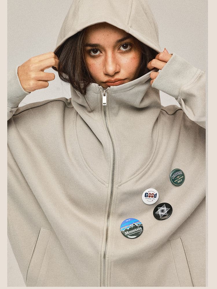 Manteau gris à capuche zippé