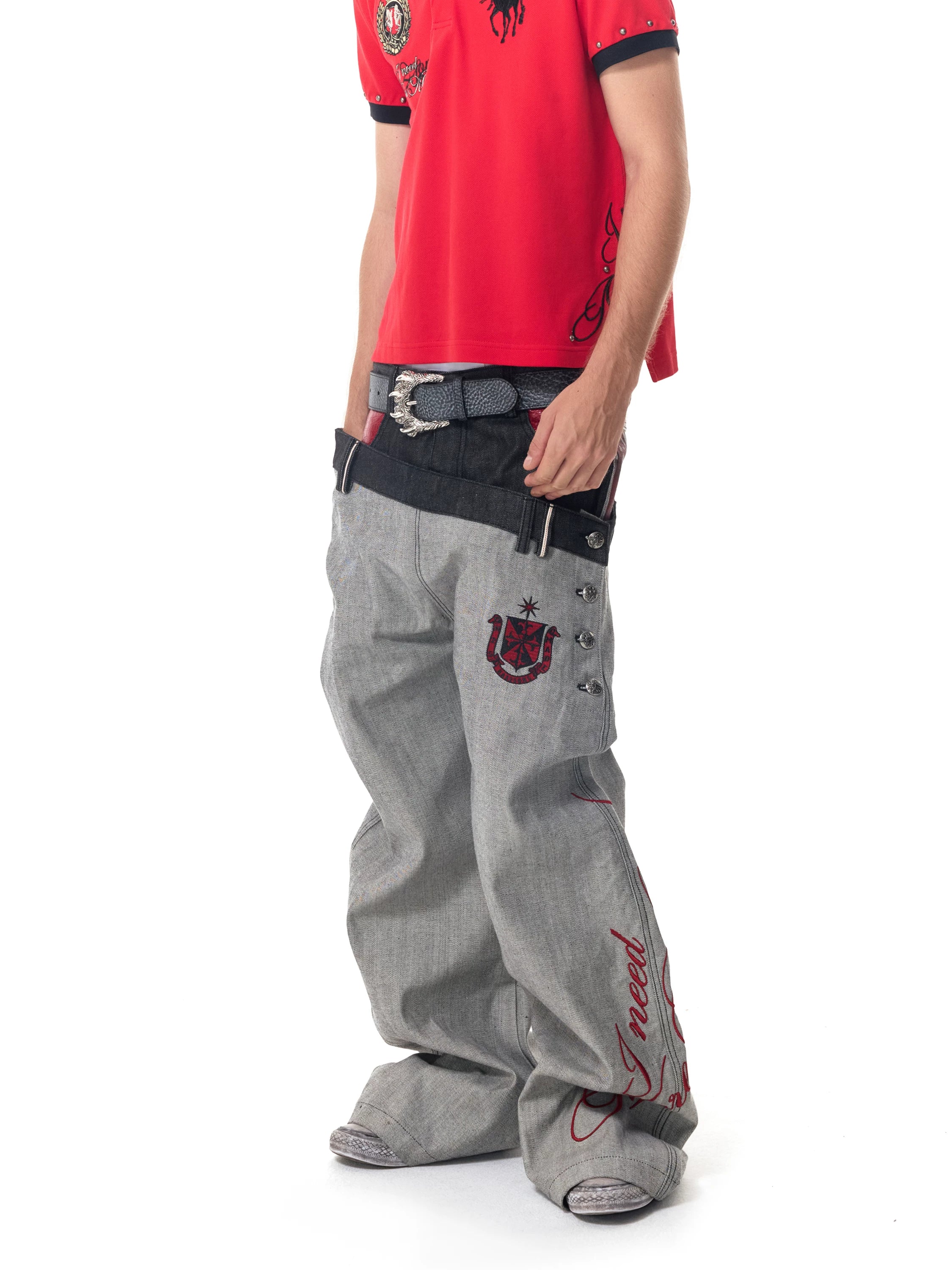 Gray curve-leg jeans front studio styling