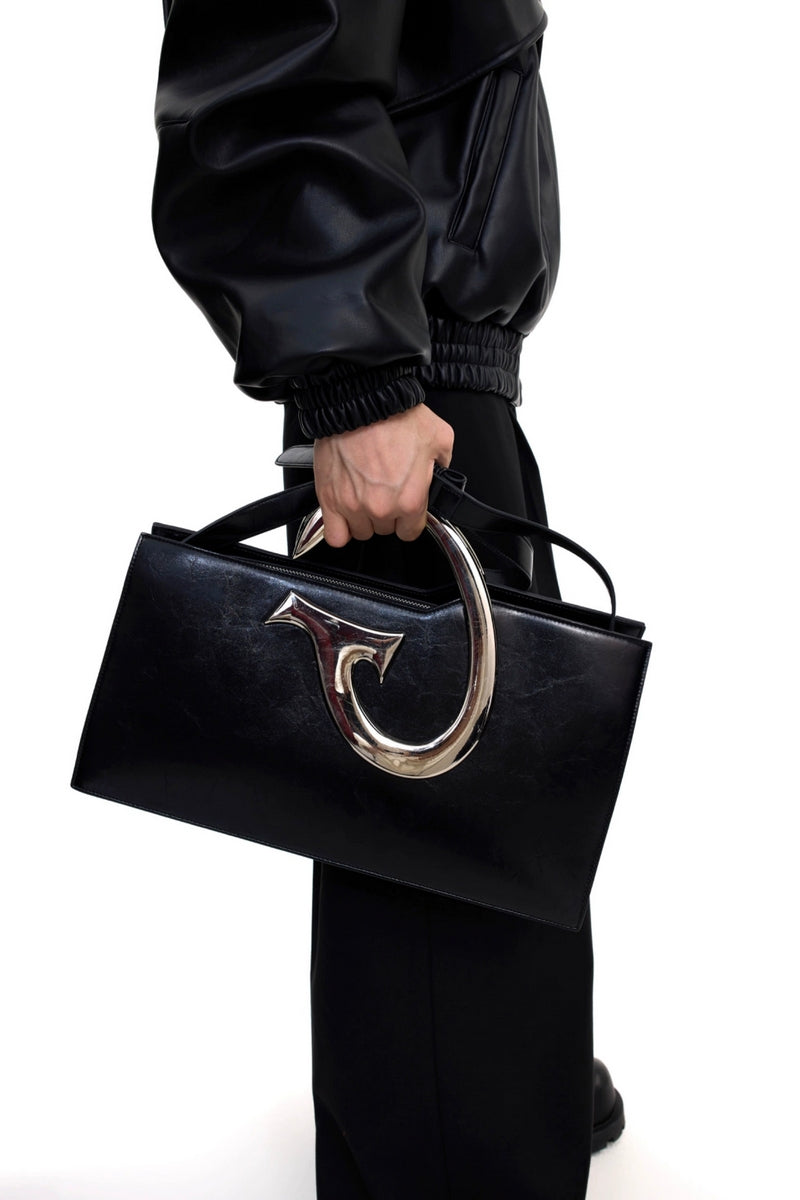 Avant-Garde Metal Handle Shoulder Bag - Sleek Black Designer Tote
