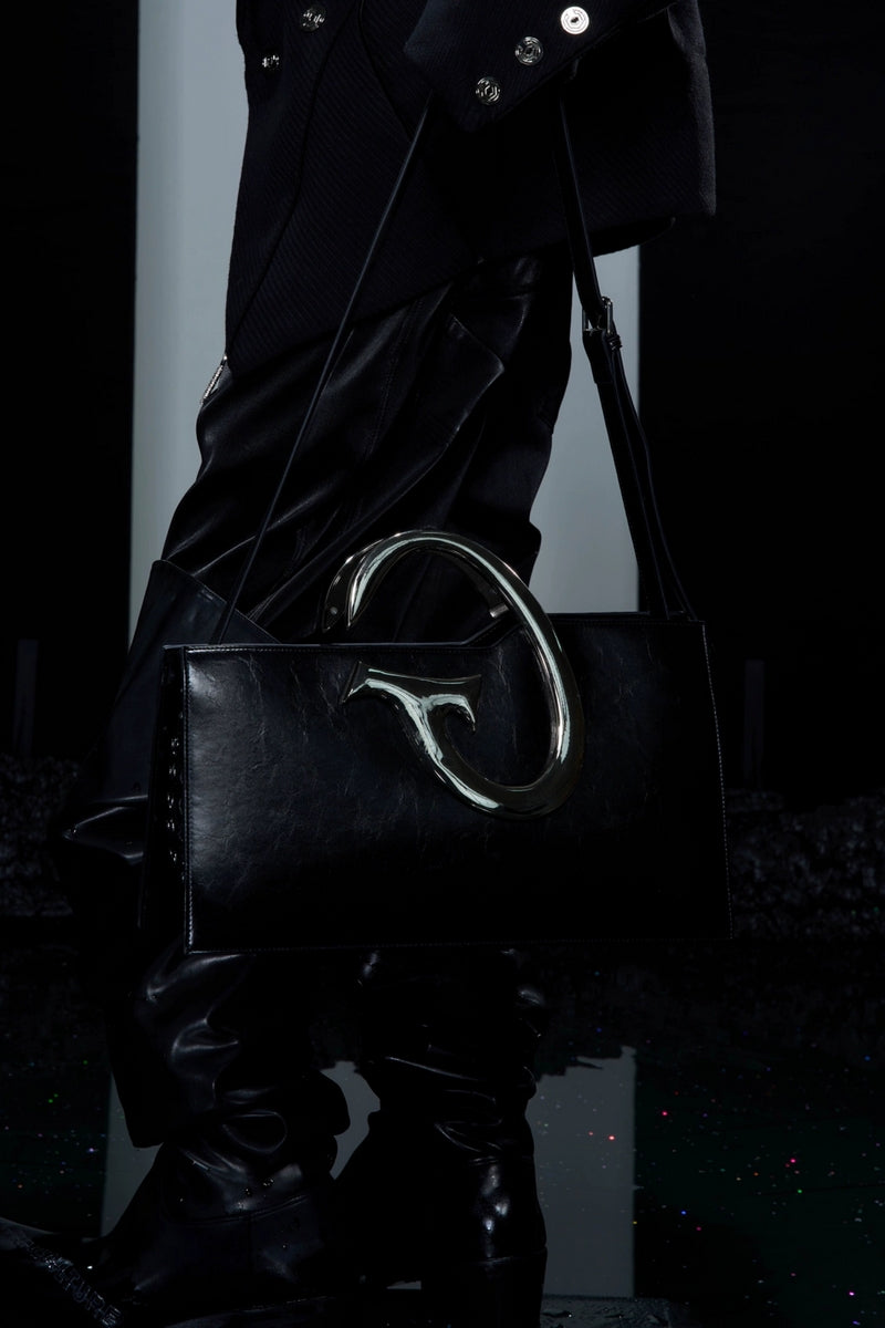 Avant-Garde Metal Handle Shoulder Bag - Sleek Black Designer Tote