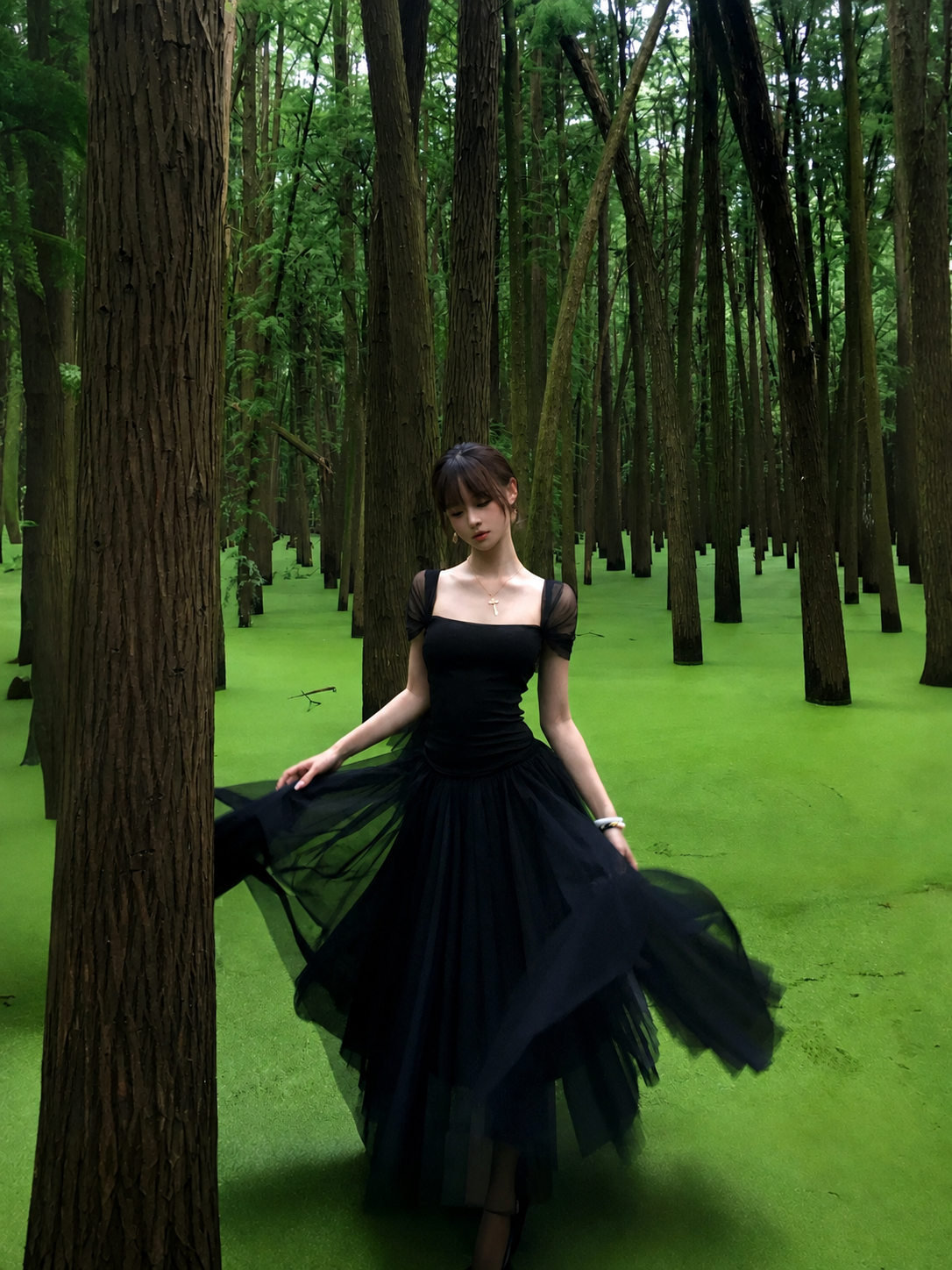 Black draped multi-way off-shoulder top, full front view