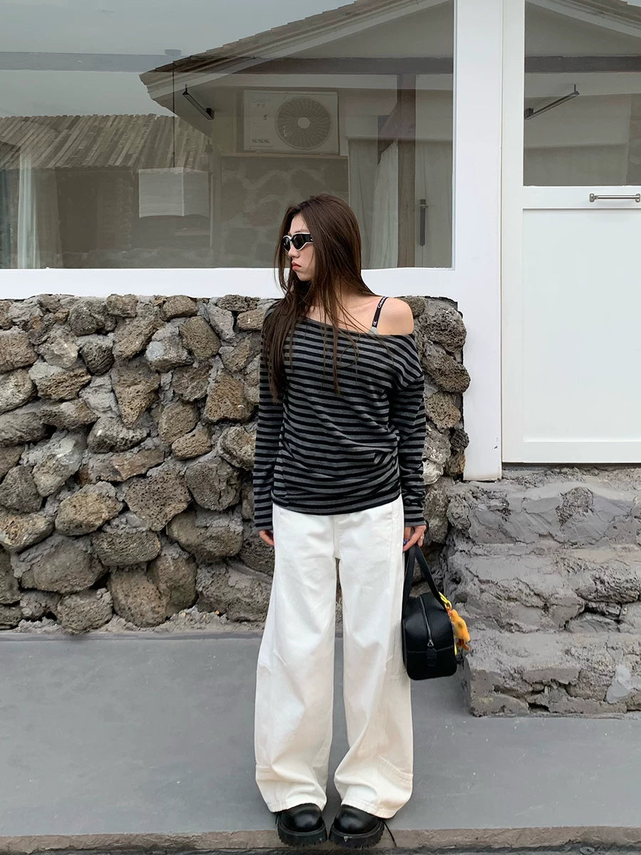 White panel-seam wide-leg jeans styled outdoors
