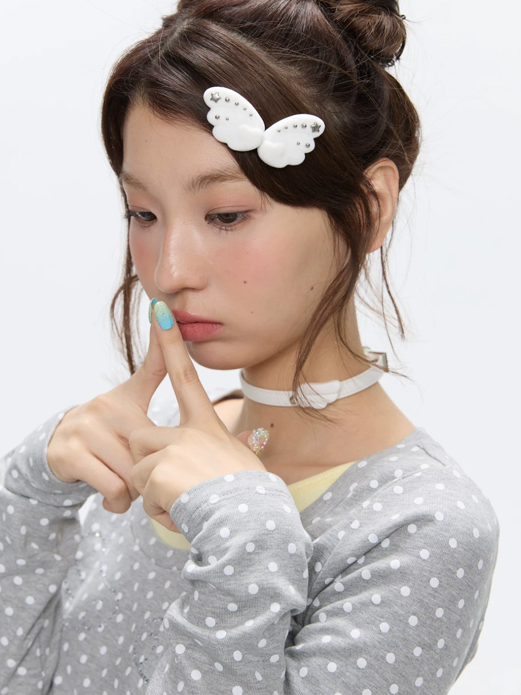 White Flocked Wing Hair Clip Pair — product view 3