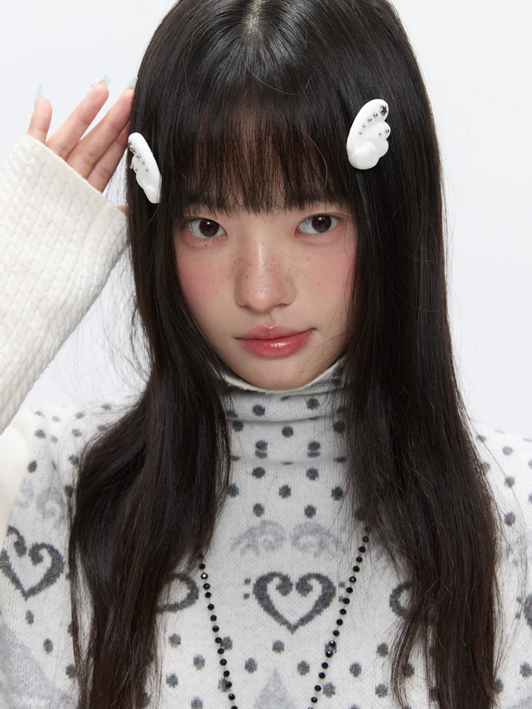 White Flocked Wing Hair Clip Pair — product view 6