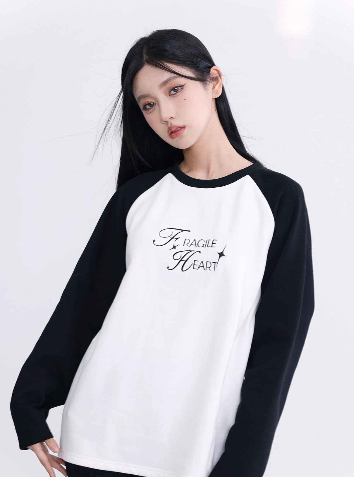 Fragile Heart Raglan Sweatshirt