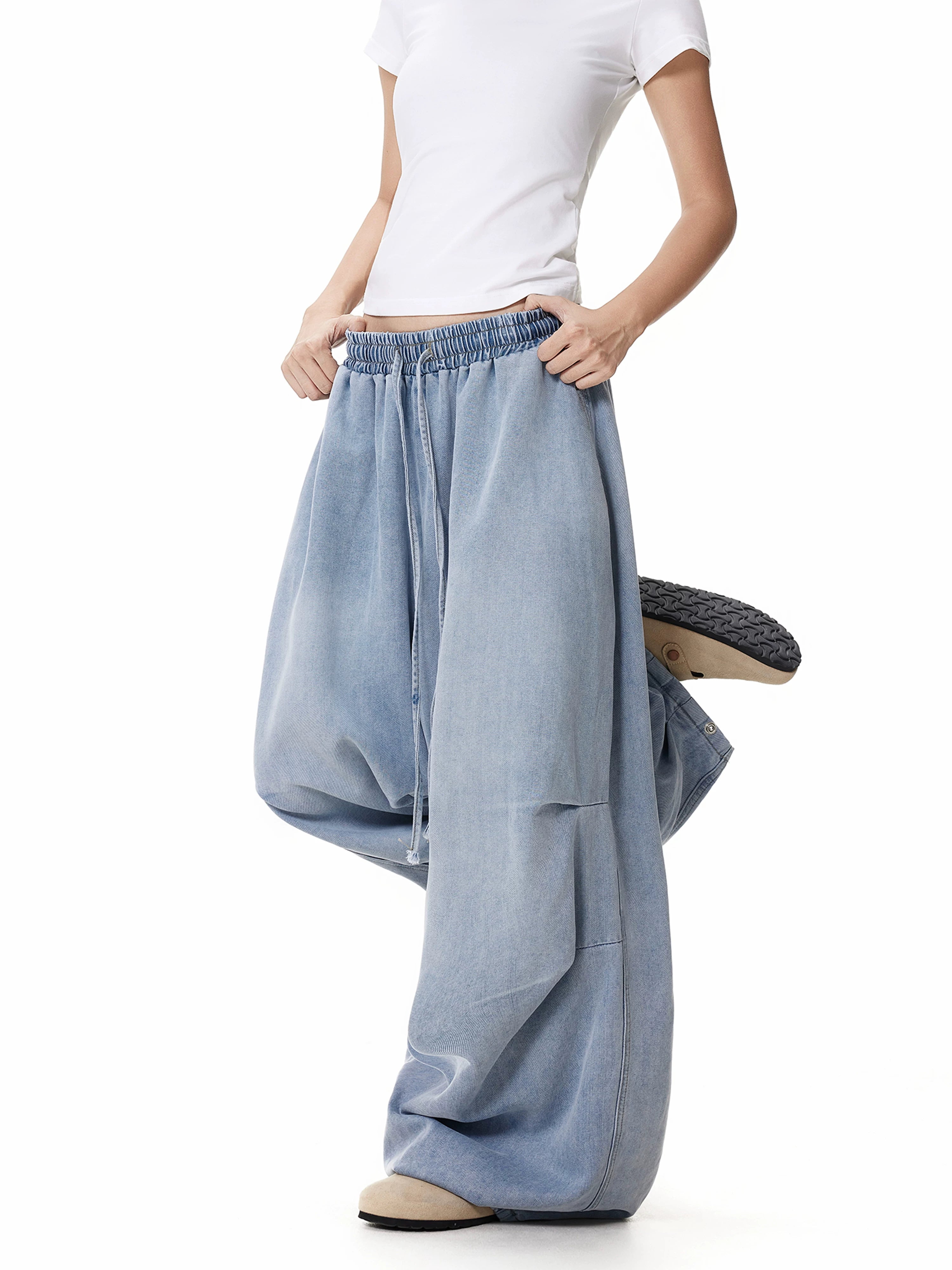 Wrinkled drawstring wide-leg jeans side view