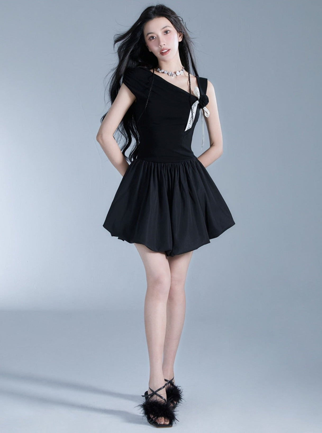 Elegant Off-Shoulder Black Mini Dress with Contrast Bow Detail