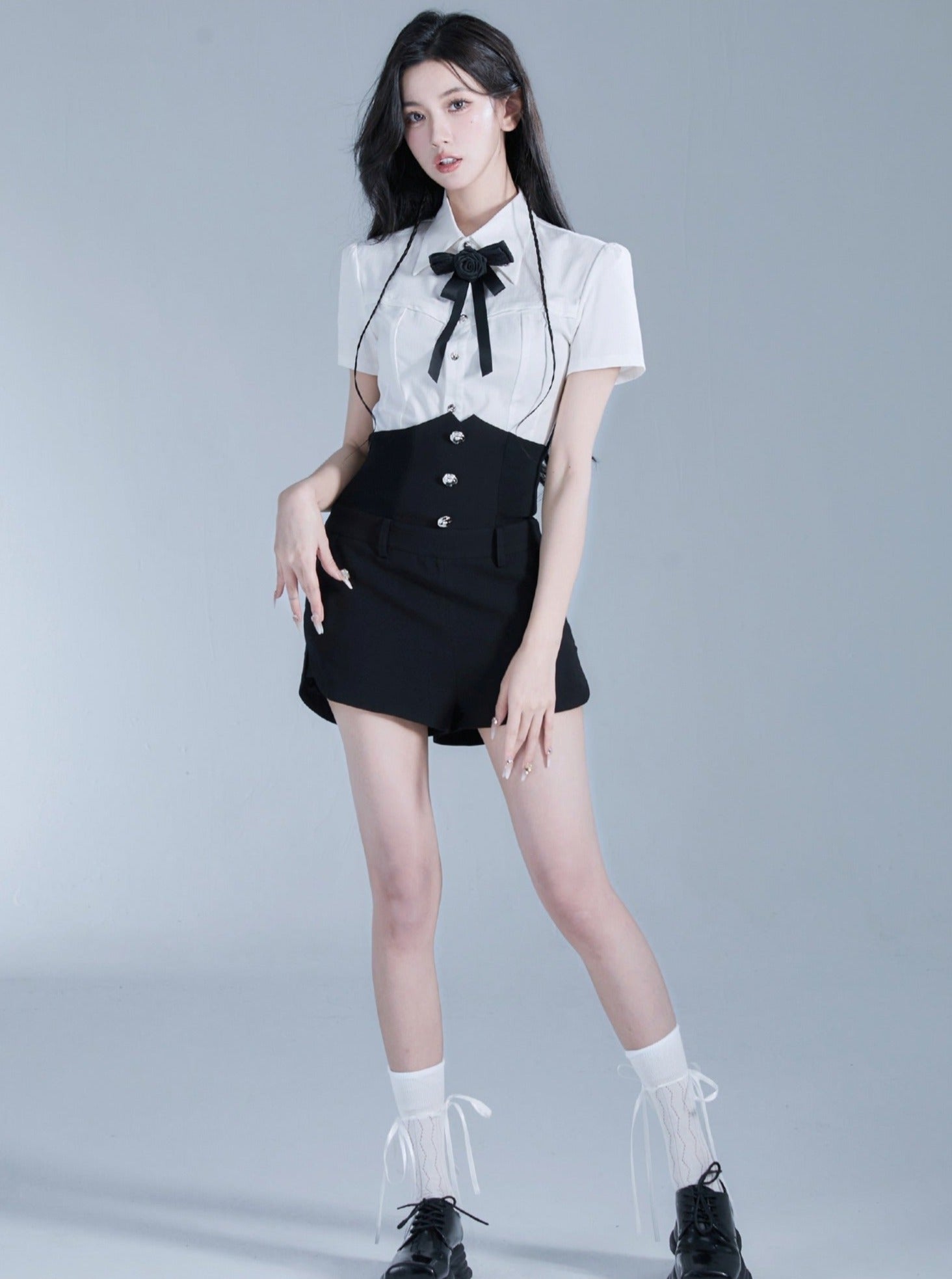 Monochrome Elegance Set: High-Waisted Corset Shorts with Cropped Bow-Tie Shirt