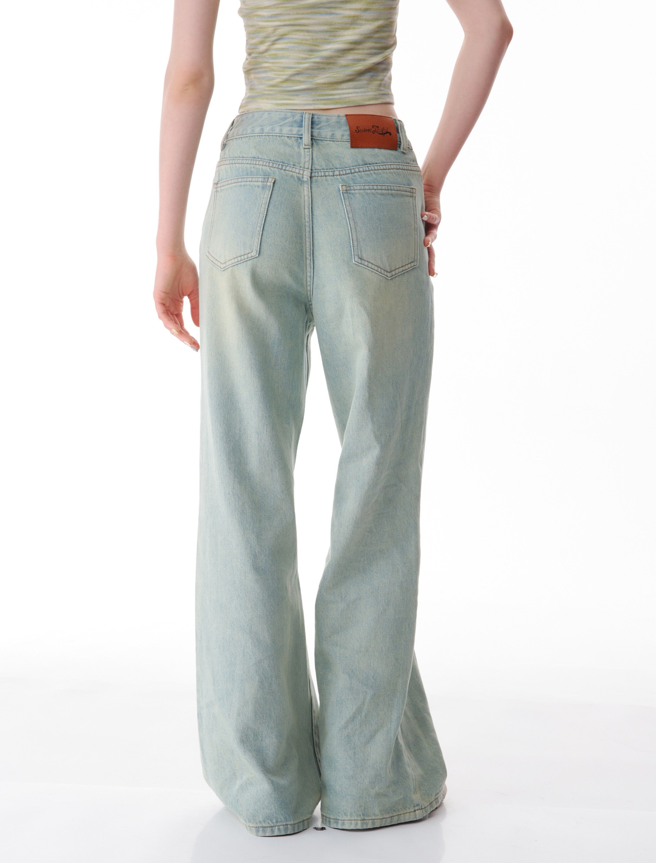 Slanted Light Wash Wide Leg Jeans