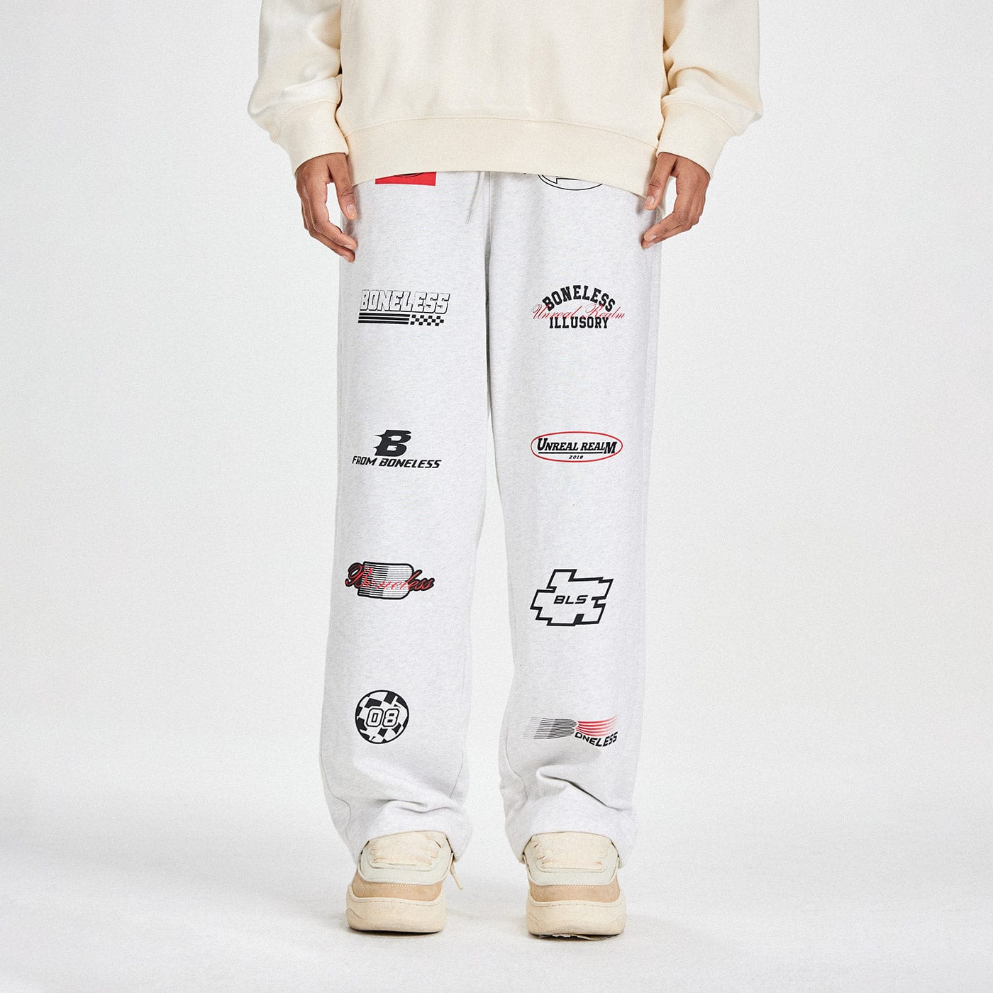 Pantalon de survêtement à imprimé multi-logo