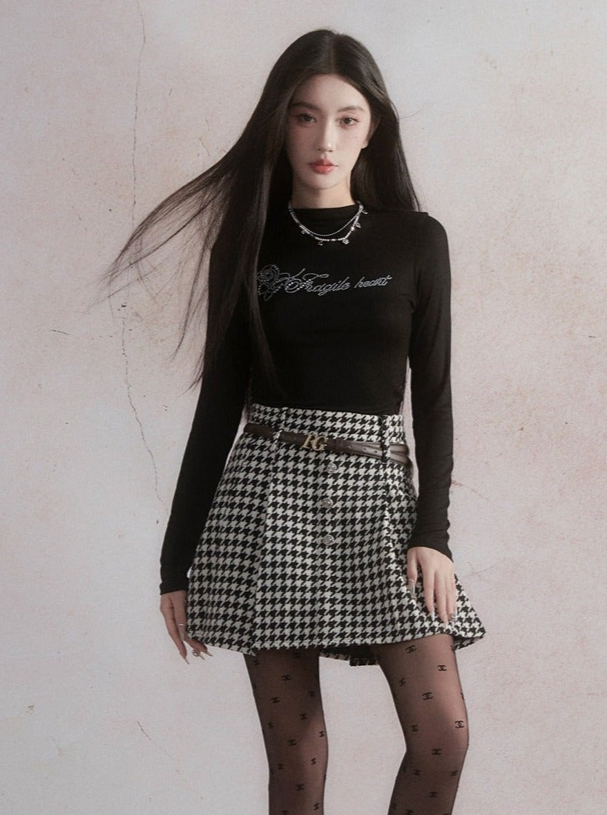 Elegant Contrast: Graphic Crop Top and Houndstooth Skirt Set