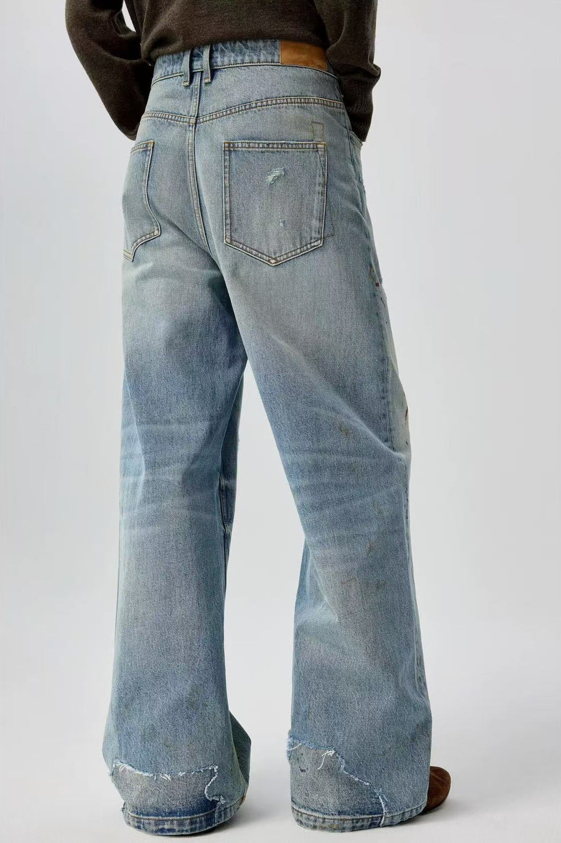 Splatter Distressed Twisted-Seam Jeans