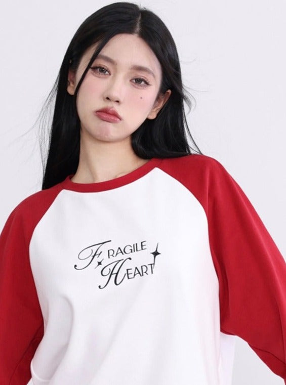 Fragile Heart Raglan Sweatshirt