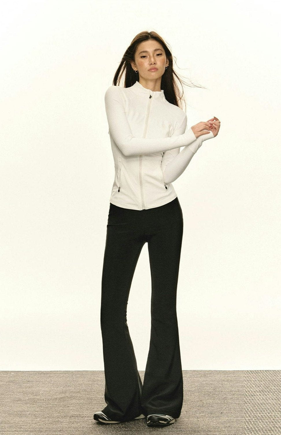 White Fitted Athletic Jacket with Mock Neck and Zip Pockets