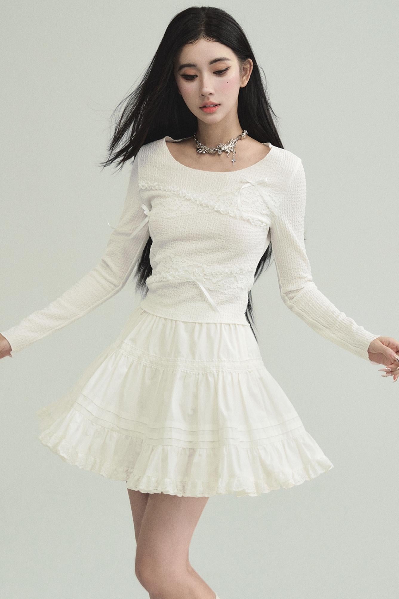 Ethereal Elegance: Ivory Long-Sleeve Crop Top with Asymmetrical Lace Overlay