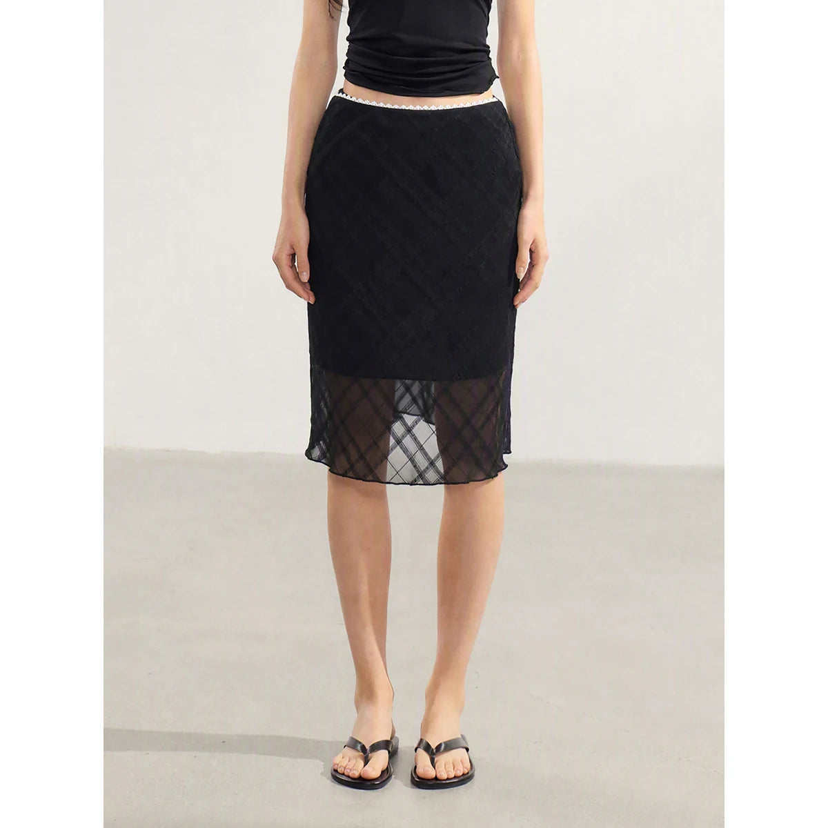 Low-rise black lace panel midi skirt front