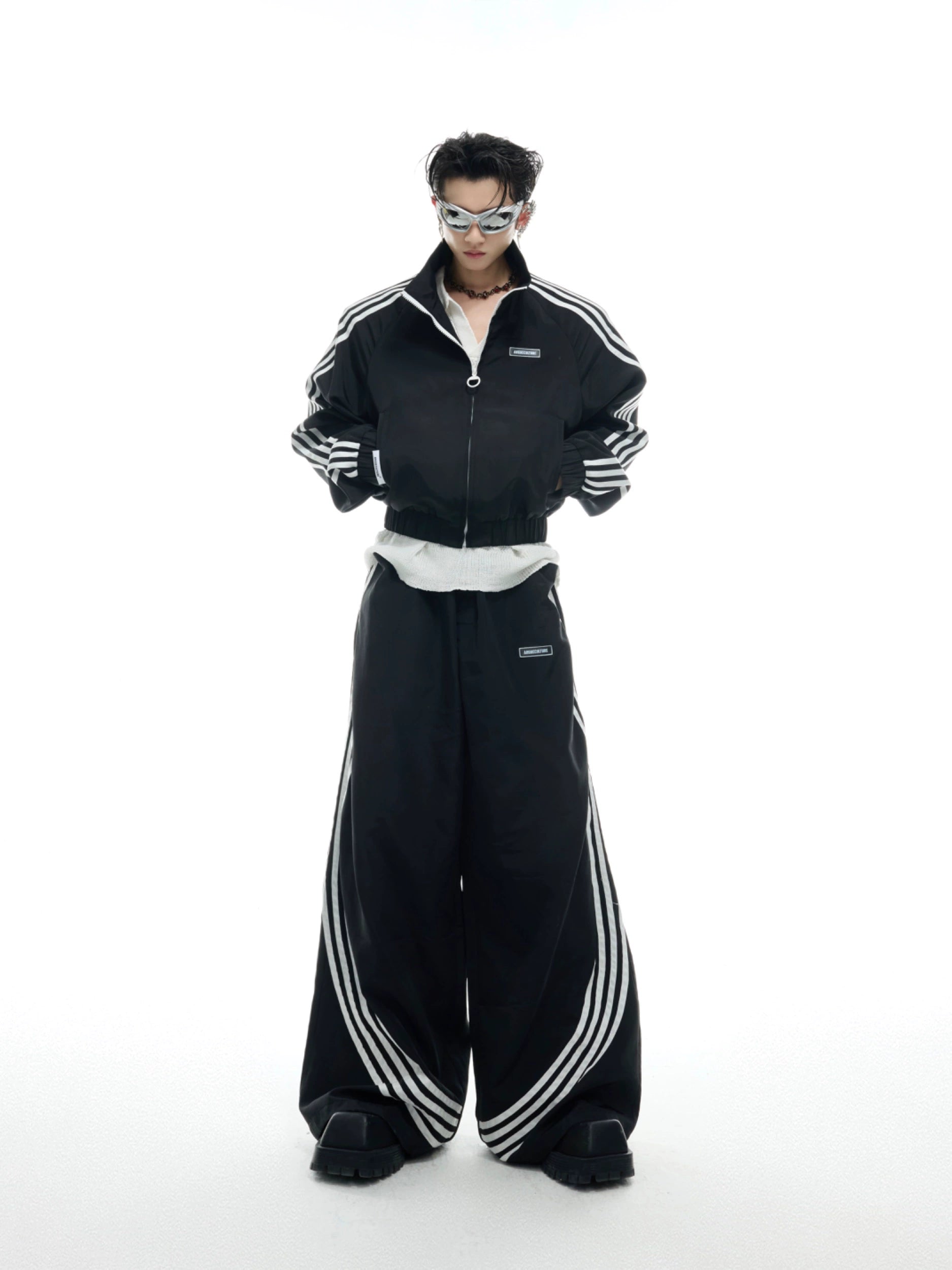 Black Track Jumpsuit with White Stripe Detail