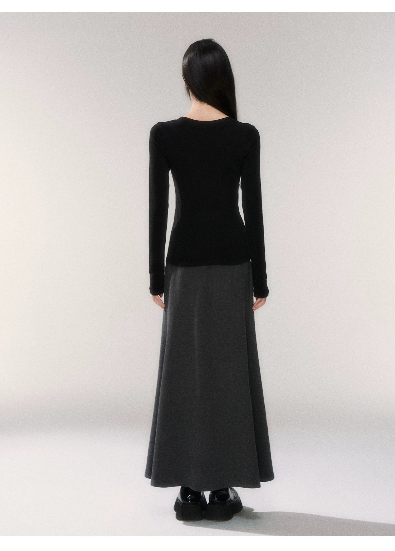 Noir Silhouette Buttoned V‑Neck Top