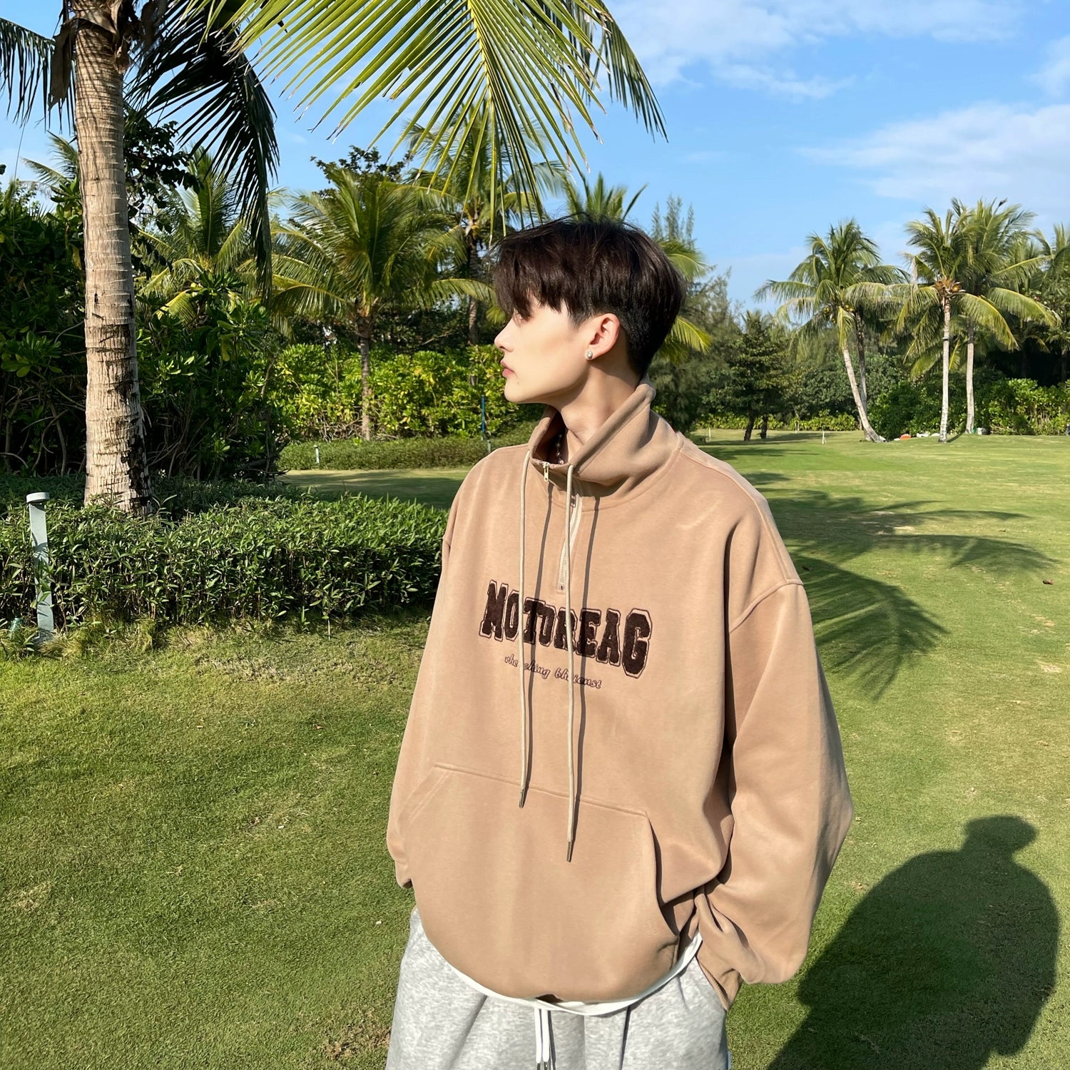 Quarter-Zip Mock Neck Sweatshirt with Embroidered Text