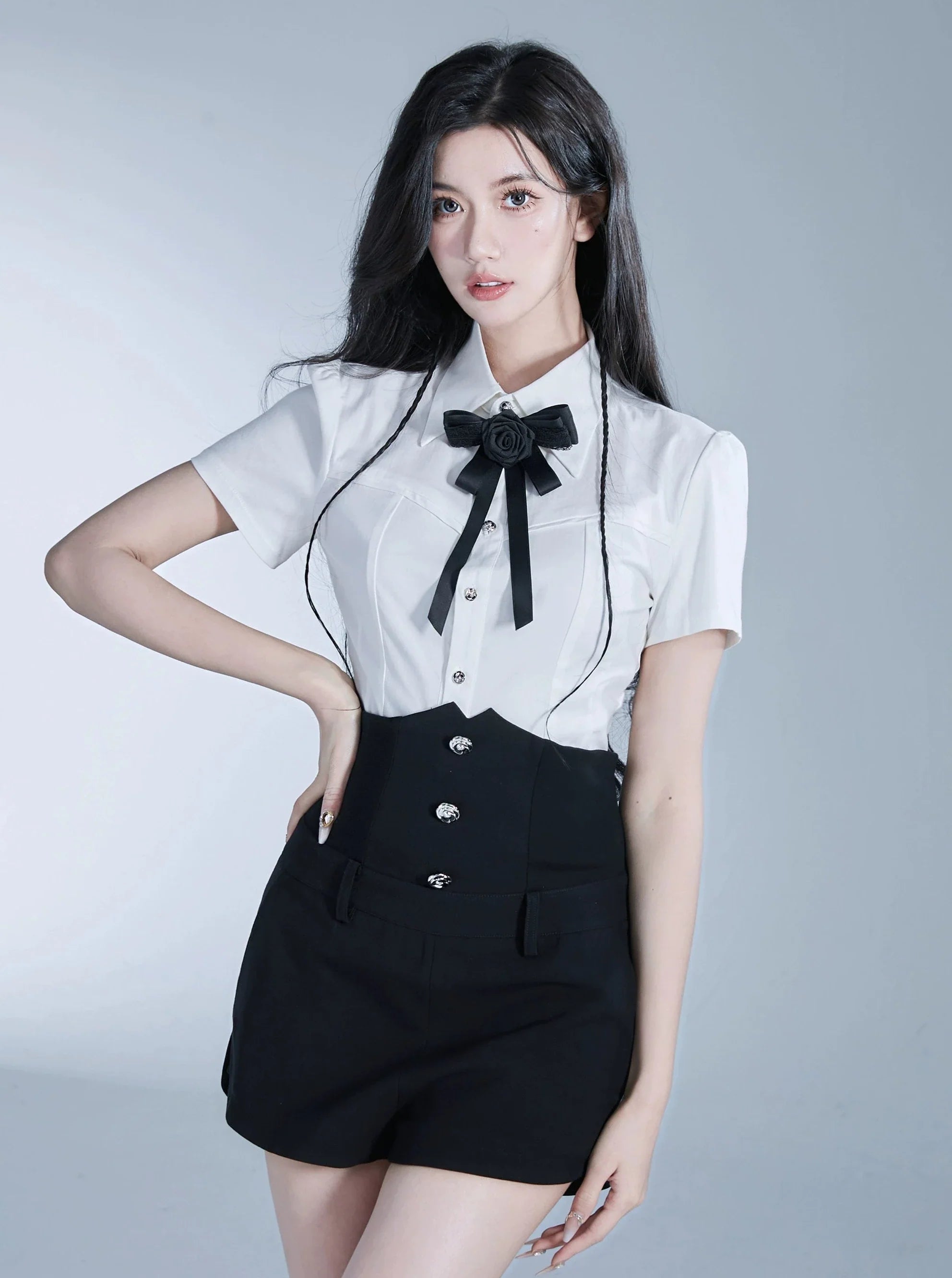 Monochrome Elegance Set: High-Waisted Corset Shorts with Cropped Bow-Tie Shirt