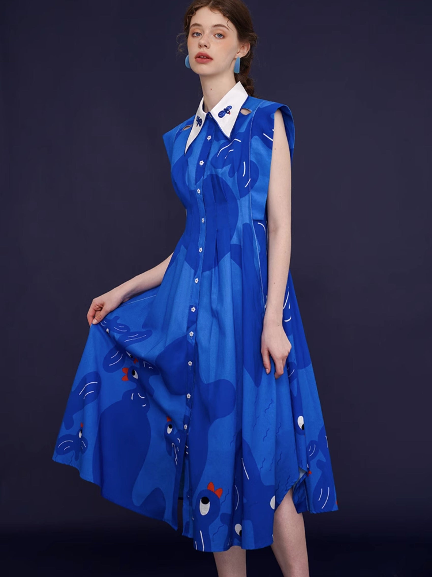 Whimsical Black and White Gown with Birds Motif