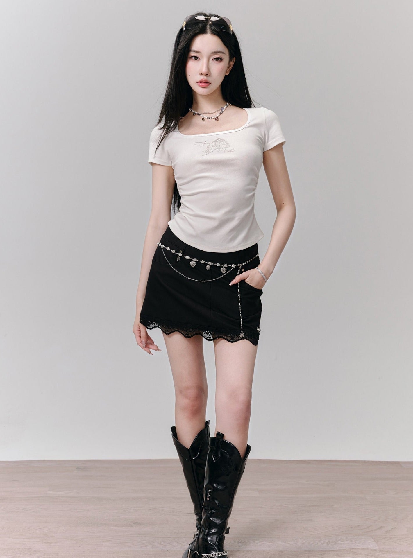 Classic Elegance Mini Skirt: Black Denim with Scalloped Lace Hem