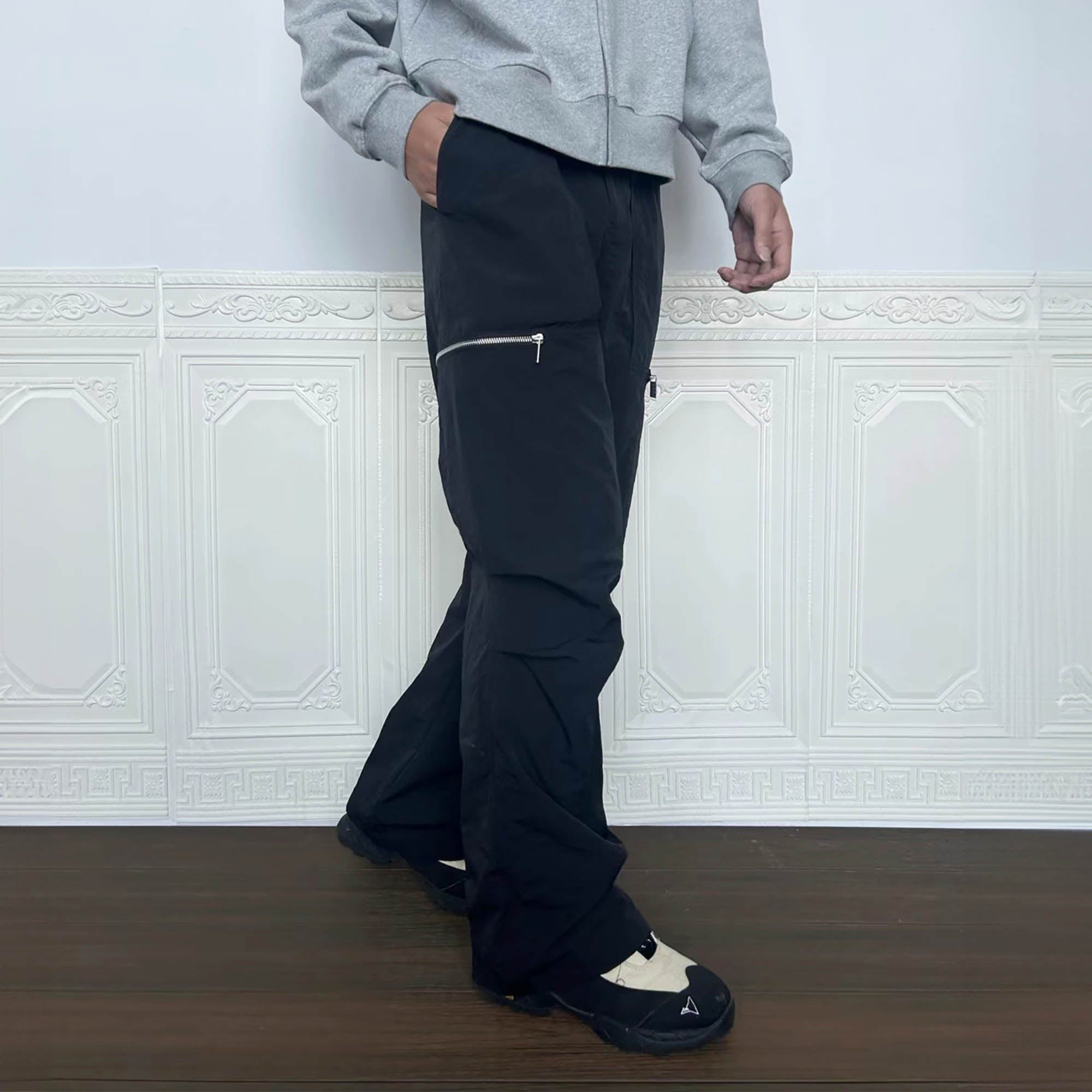 Pantalon d'utilité noire avec poches zip