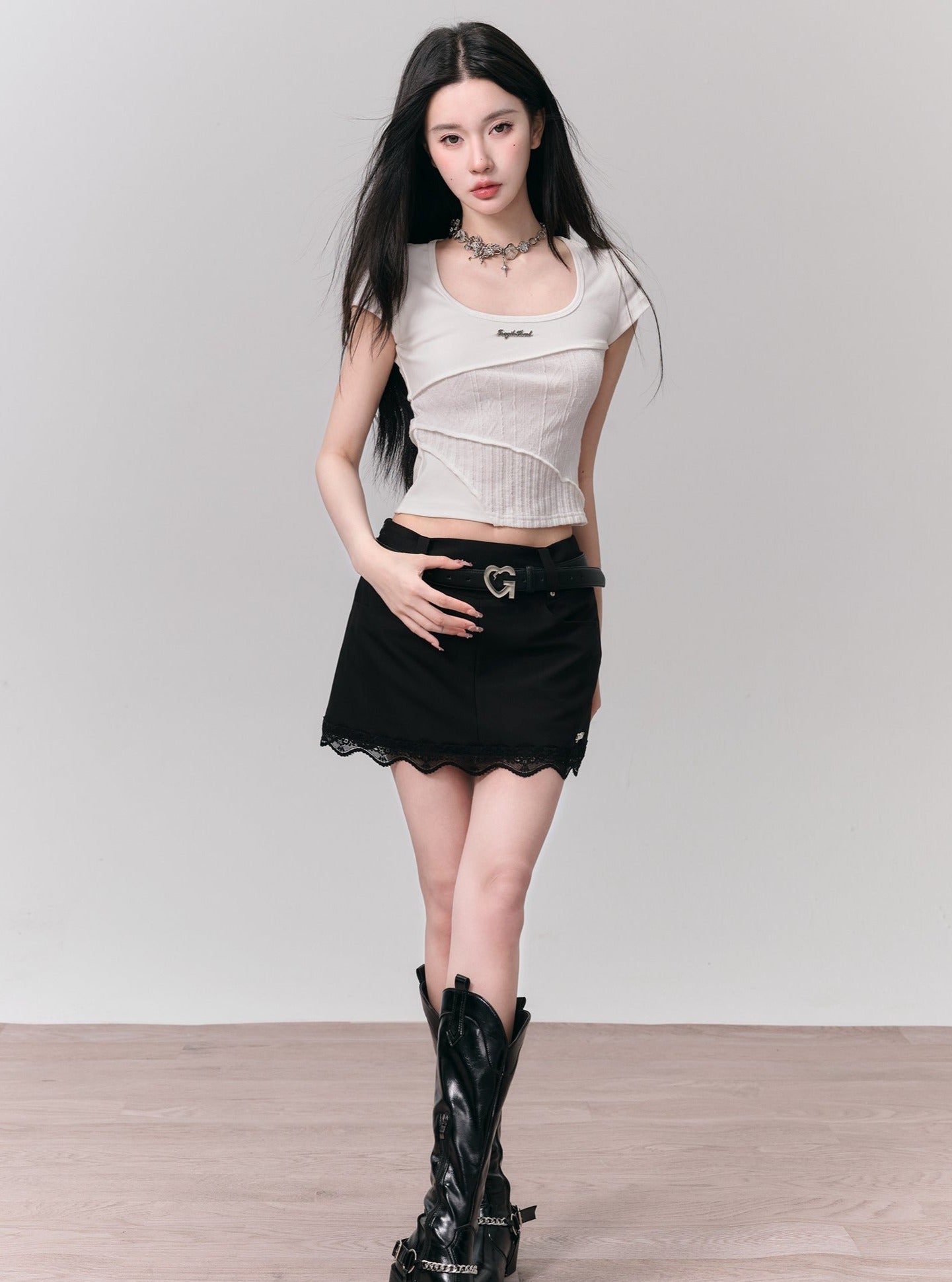 Classic Elegance Mini Skirt: Black Denim with Scalloped Lace Hem