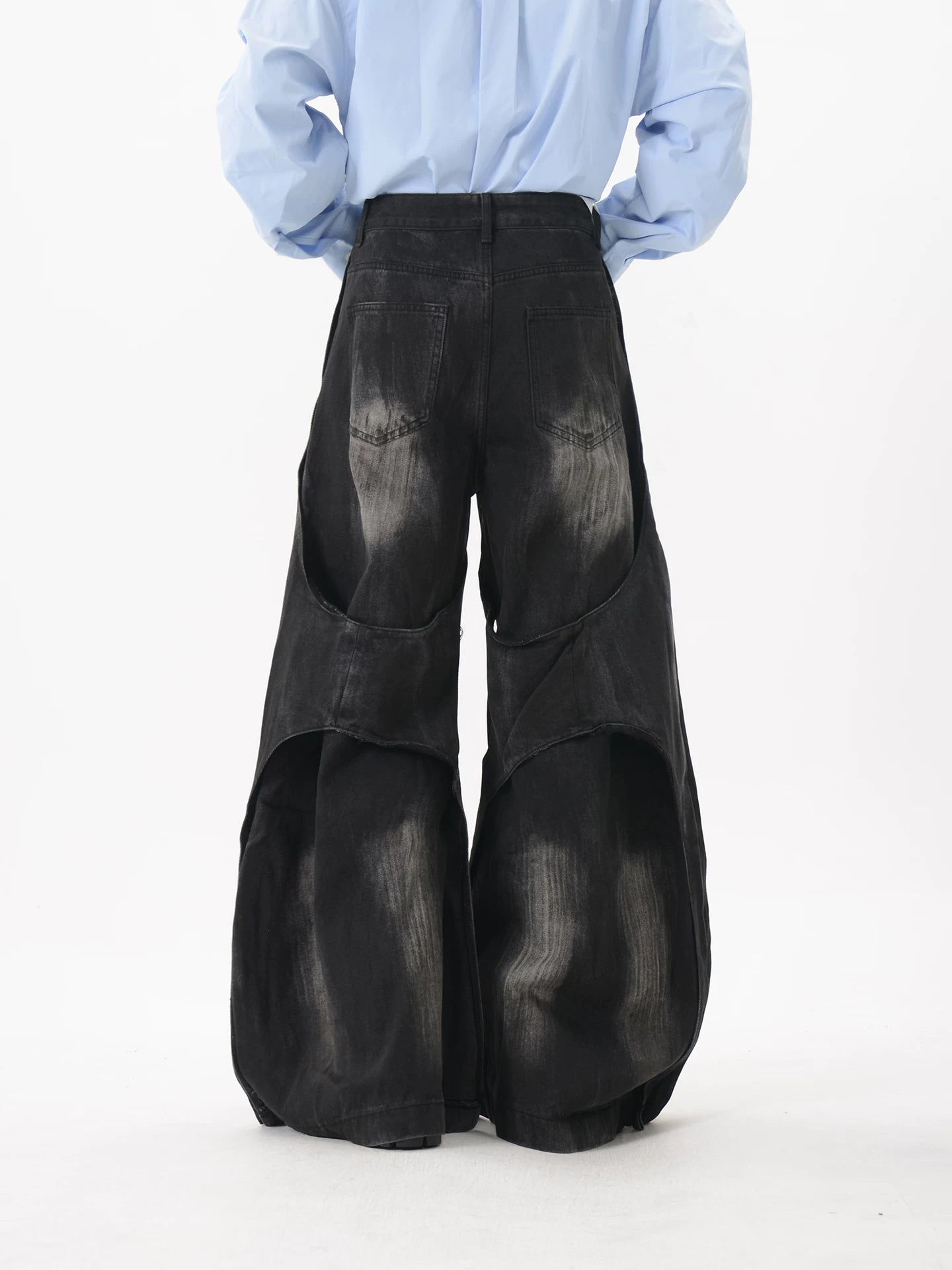 Obsidian Rift Shredded Wave Denim Trousers