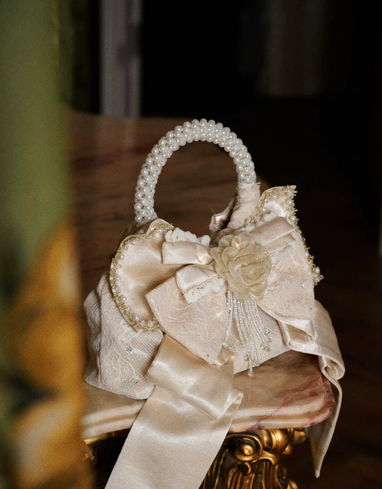 Pearl Handle Rosette Bow Mini Bag