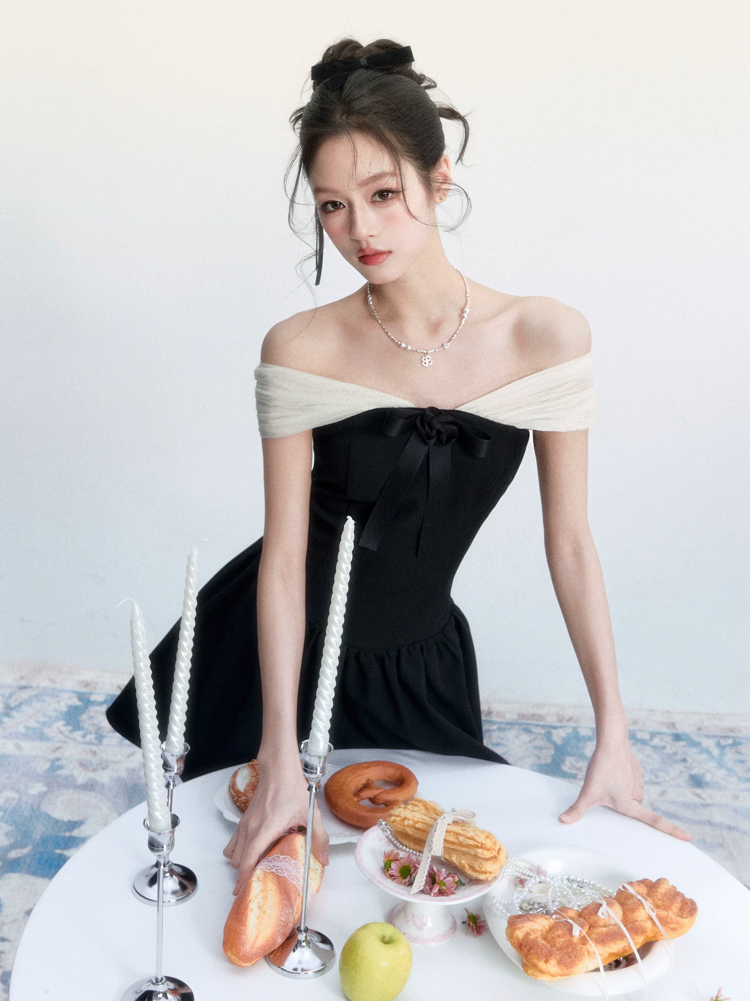Contrast Off-Shoulder Bow Mini Dress - table styling view
