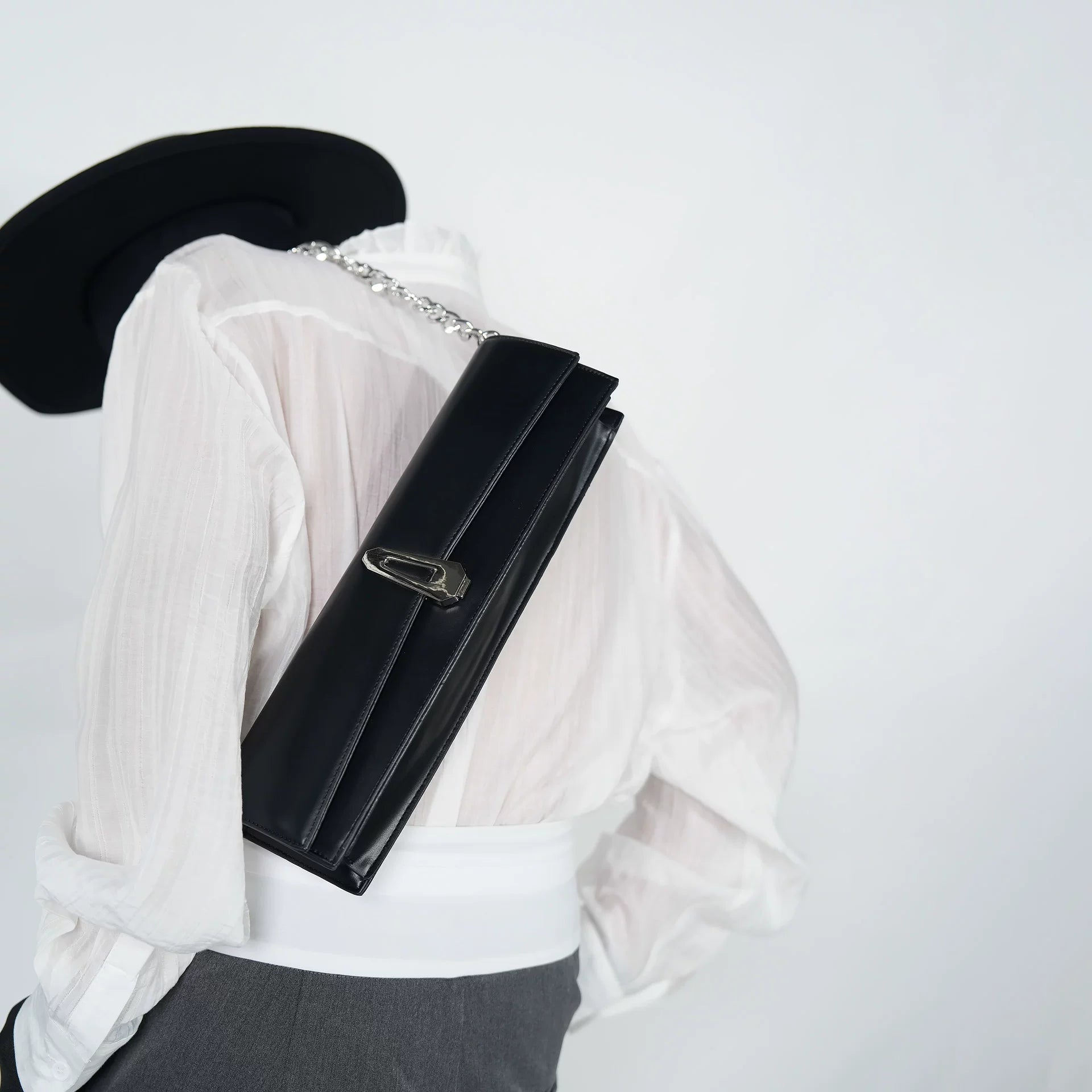 Obsidian Ledger Chain-Shoulder Clutch