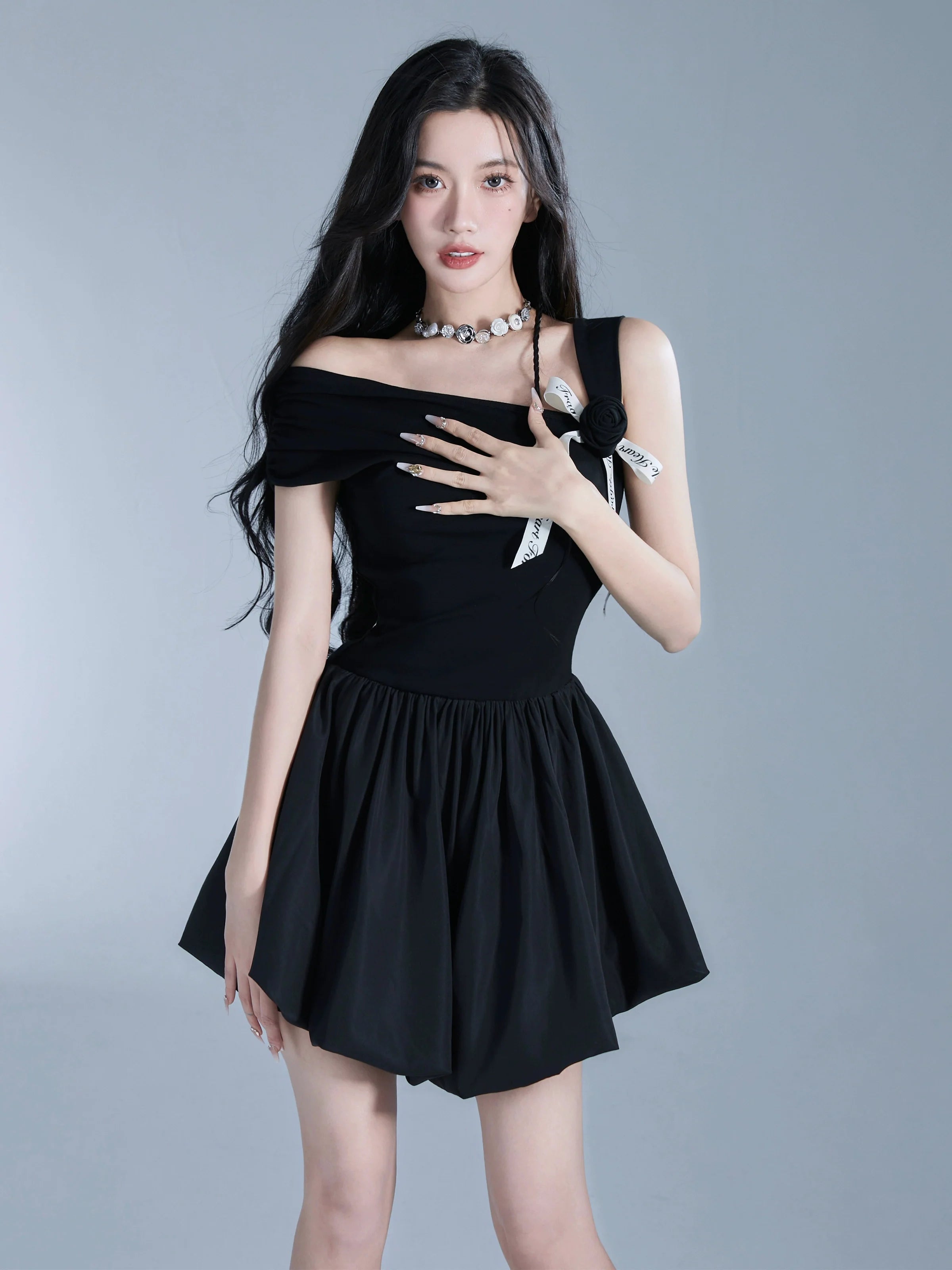 Elegant Off-Shoulder Black Mini Dress with Contrast Bow Detail