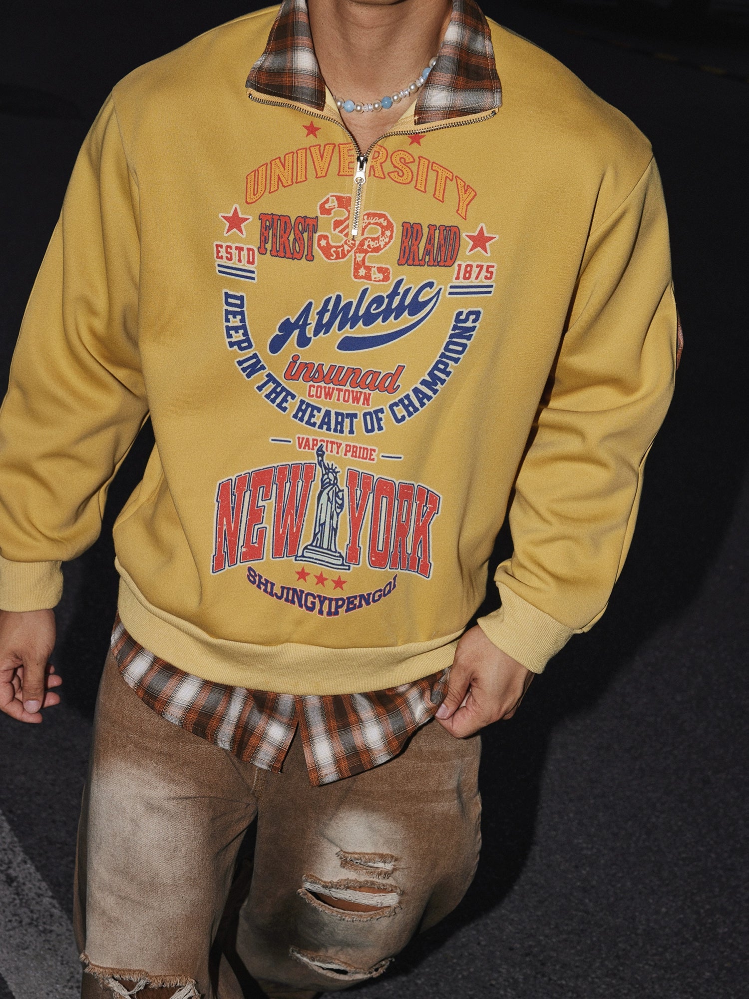 Vintage Graphic Quarter-Zip Sweatshirt with Plaid Collar