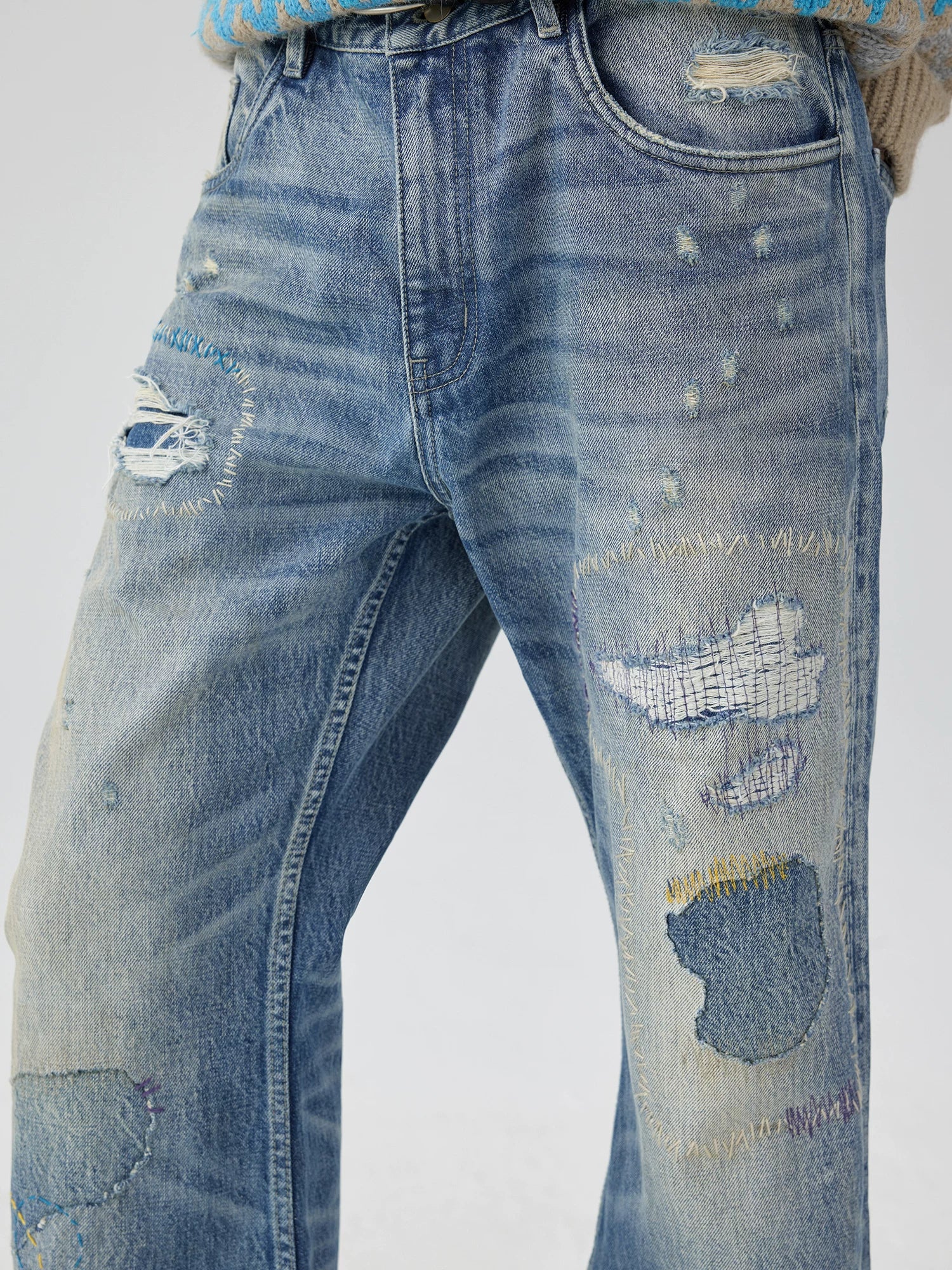 Distressed Patchwork Flared Jeans