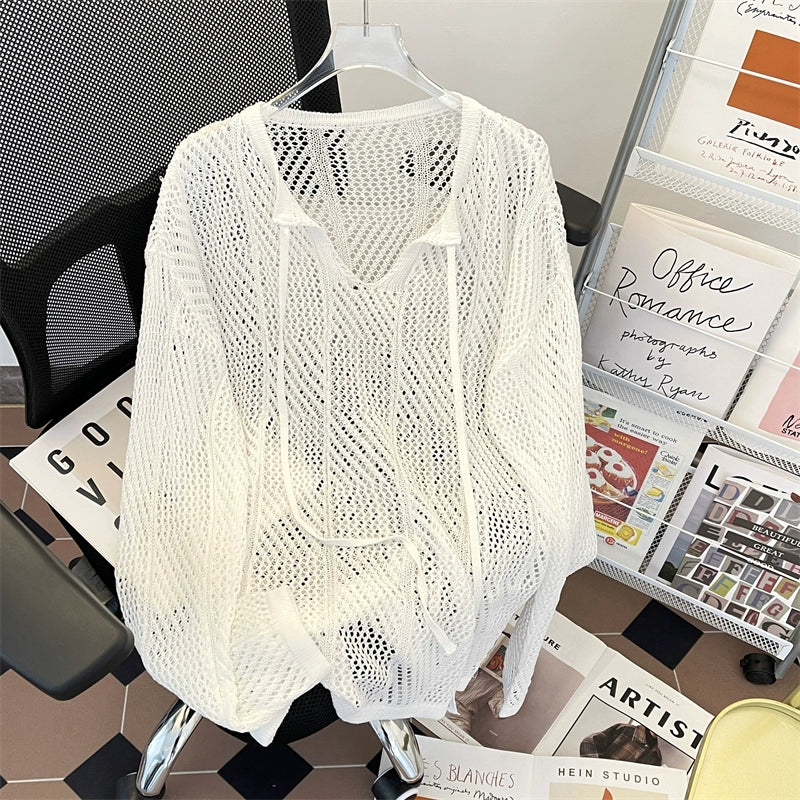 Oversized mesh knit sweater with a drawstring neckline