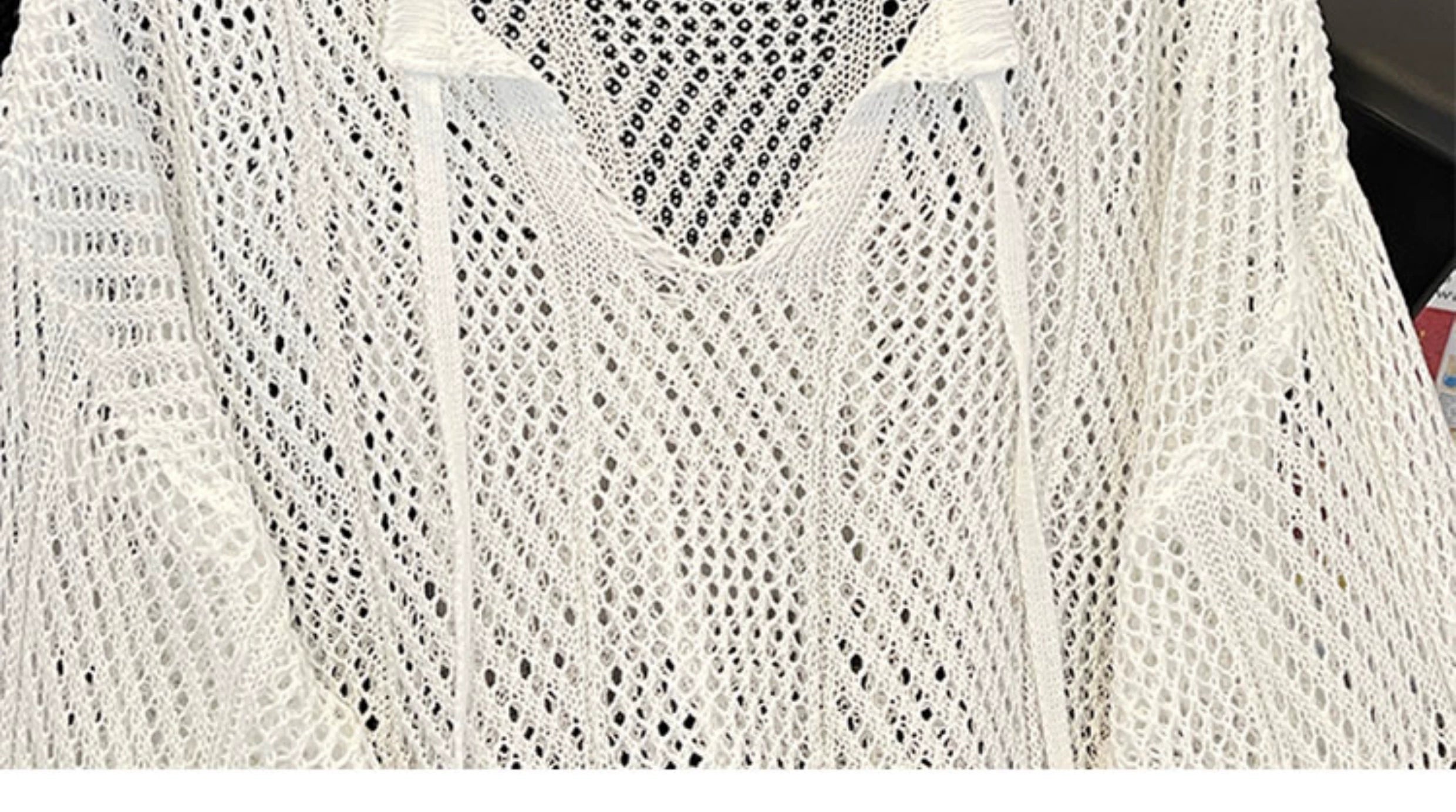 Oversized mesh knit sweater with a drawstring neckline