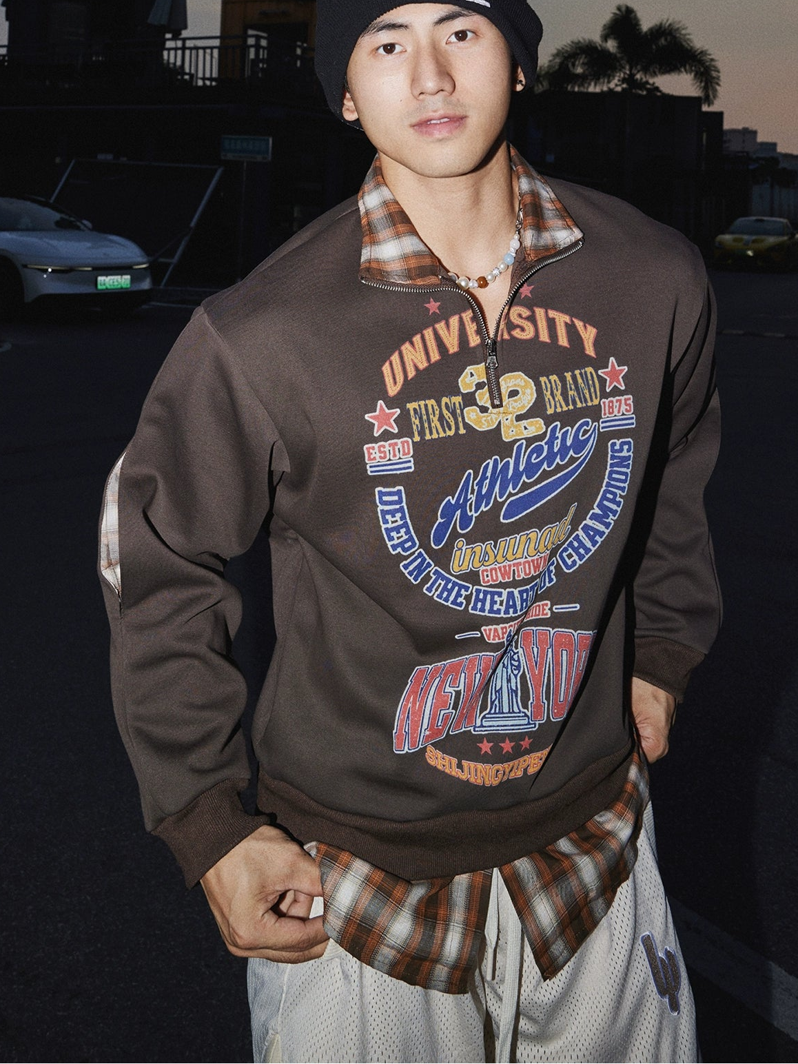 Vintage Graphic Quarter-Zip Sweatshirt with Plaid Collar