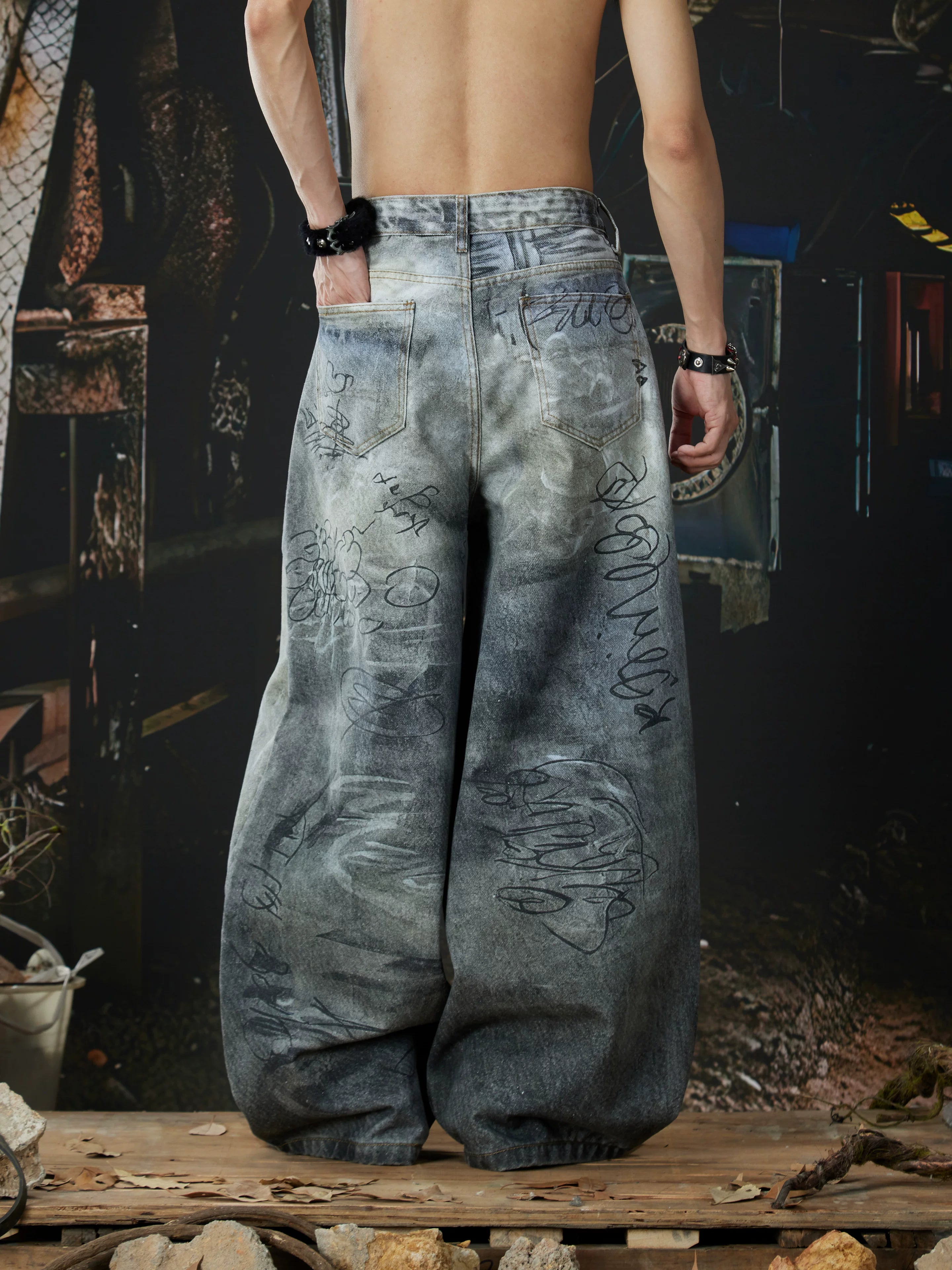 Faded Tagstorm Graffiti Wide‑Leg Jeans