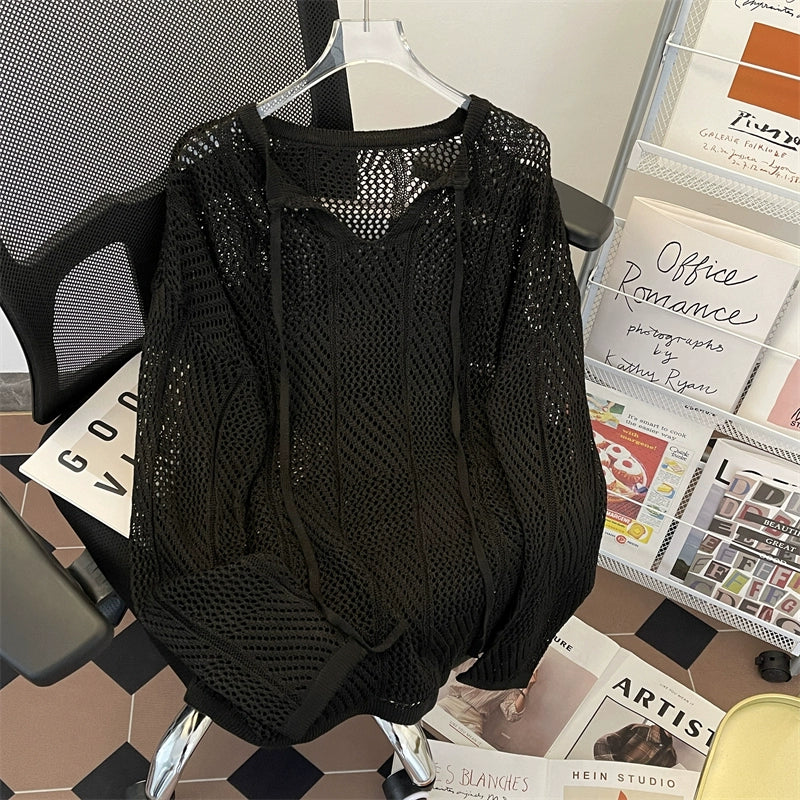 Oversized mesh knit sweater with a drawstring neckline
