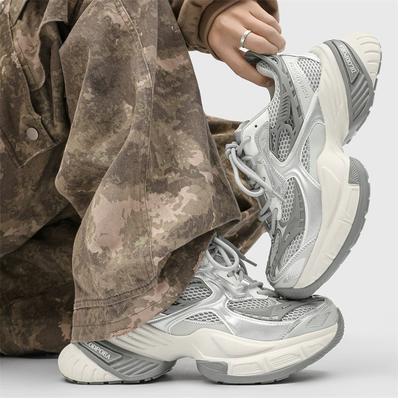 Chunky Futuristic Sneakers with Mesh Panels and Crisscross Detailing