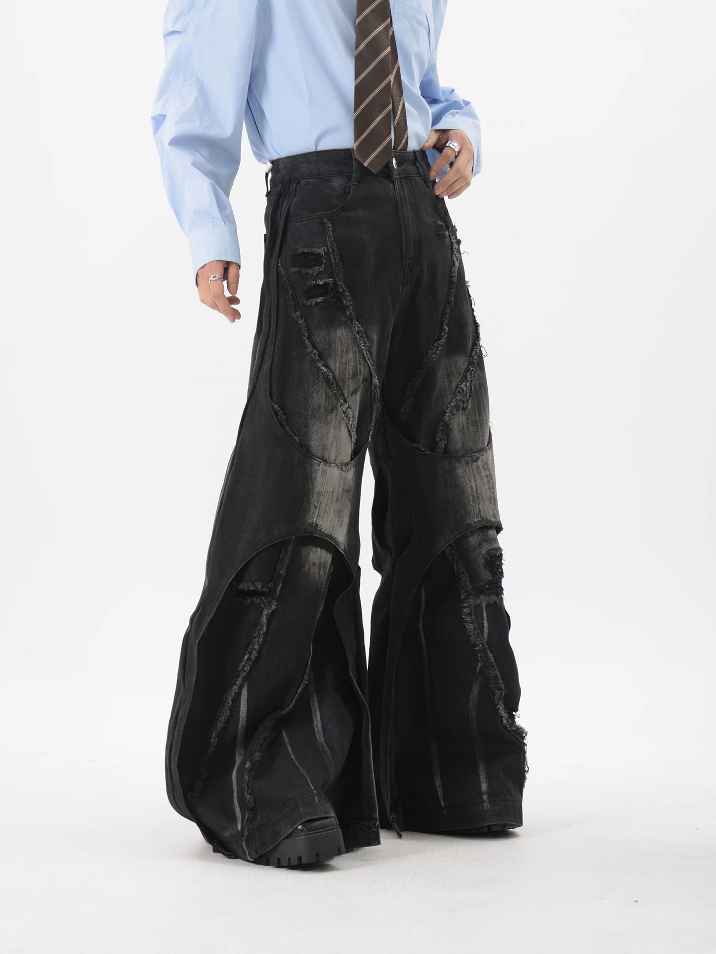 Obsidian Rift Shredded Wave Denim Trousers
