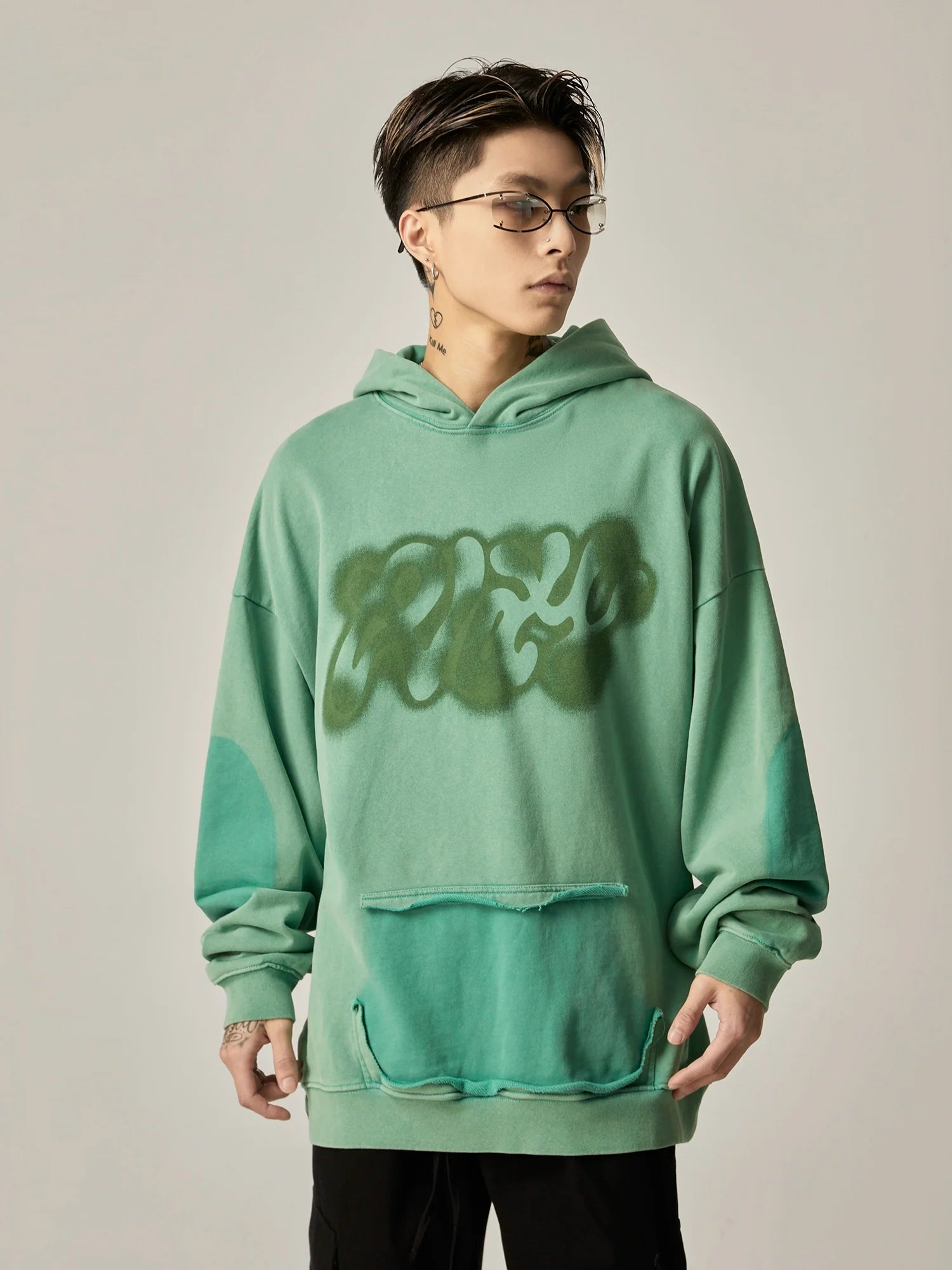 Oversized Mint Green Graffiti Hoodie with Distressed Details