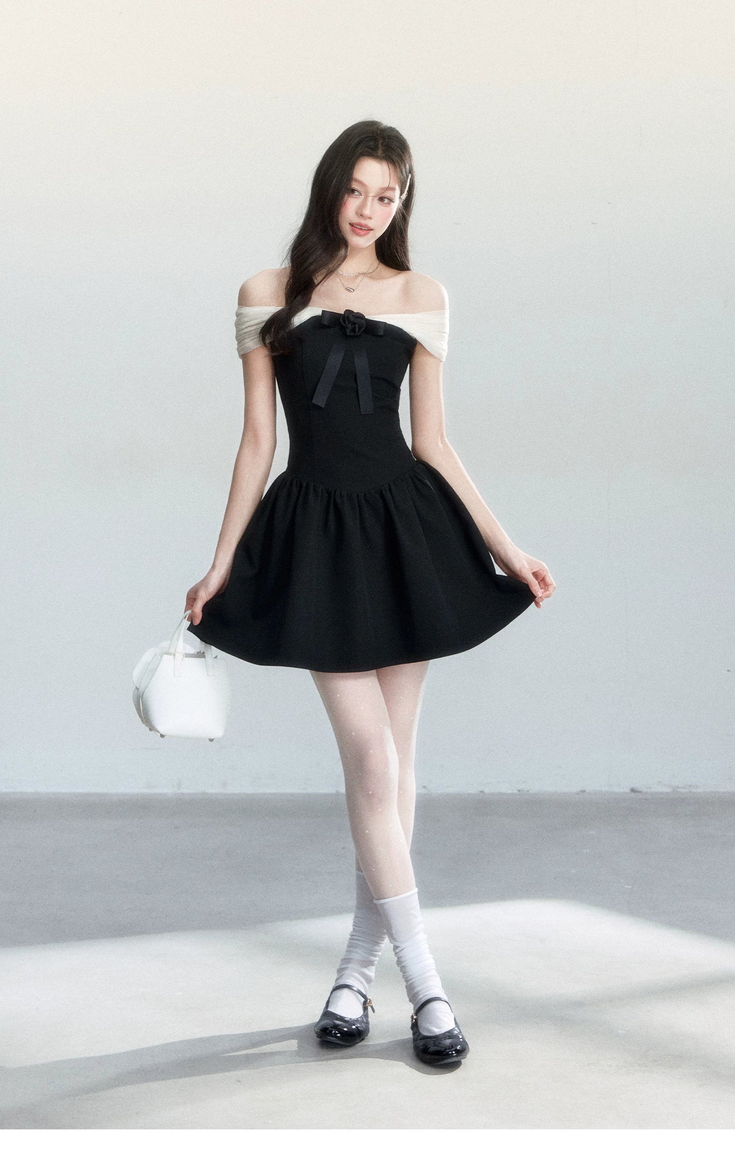 Contrast Off-Shoulder Bow Mini Dress - standing silhouette view