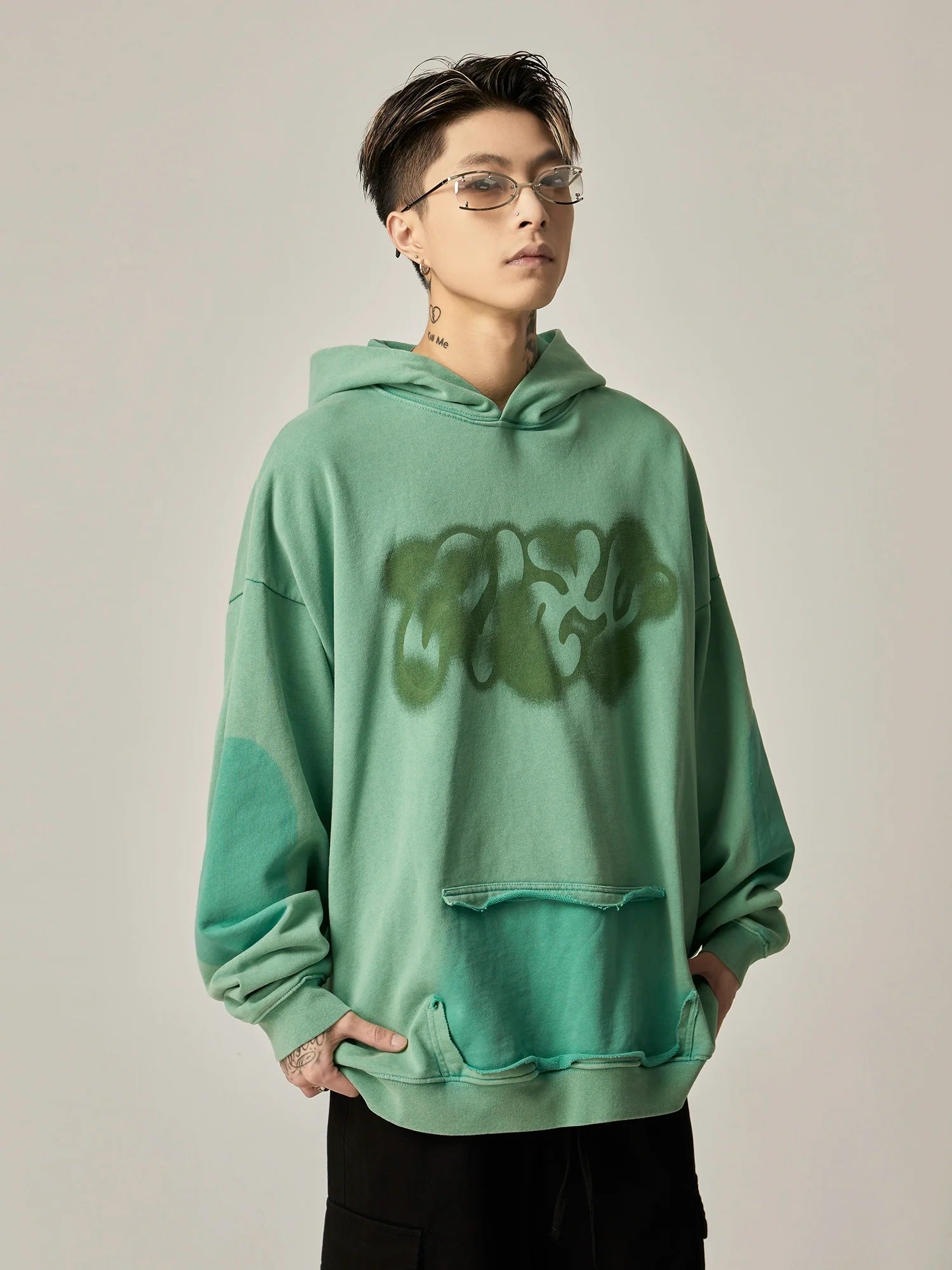 Oversized Mint Green Graffiti Hoodie with Distressed Details