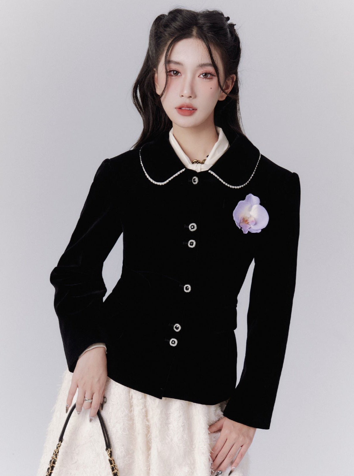 Elegant Black Fitted Blazer with Floral Brooch