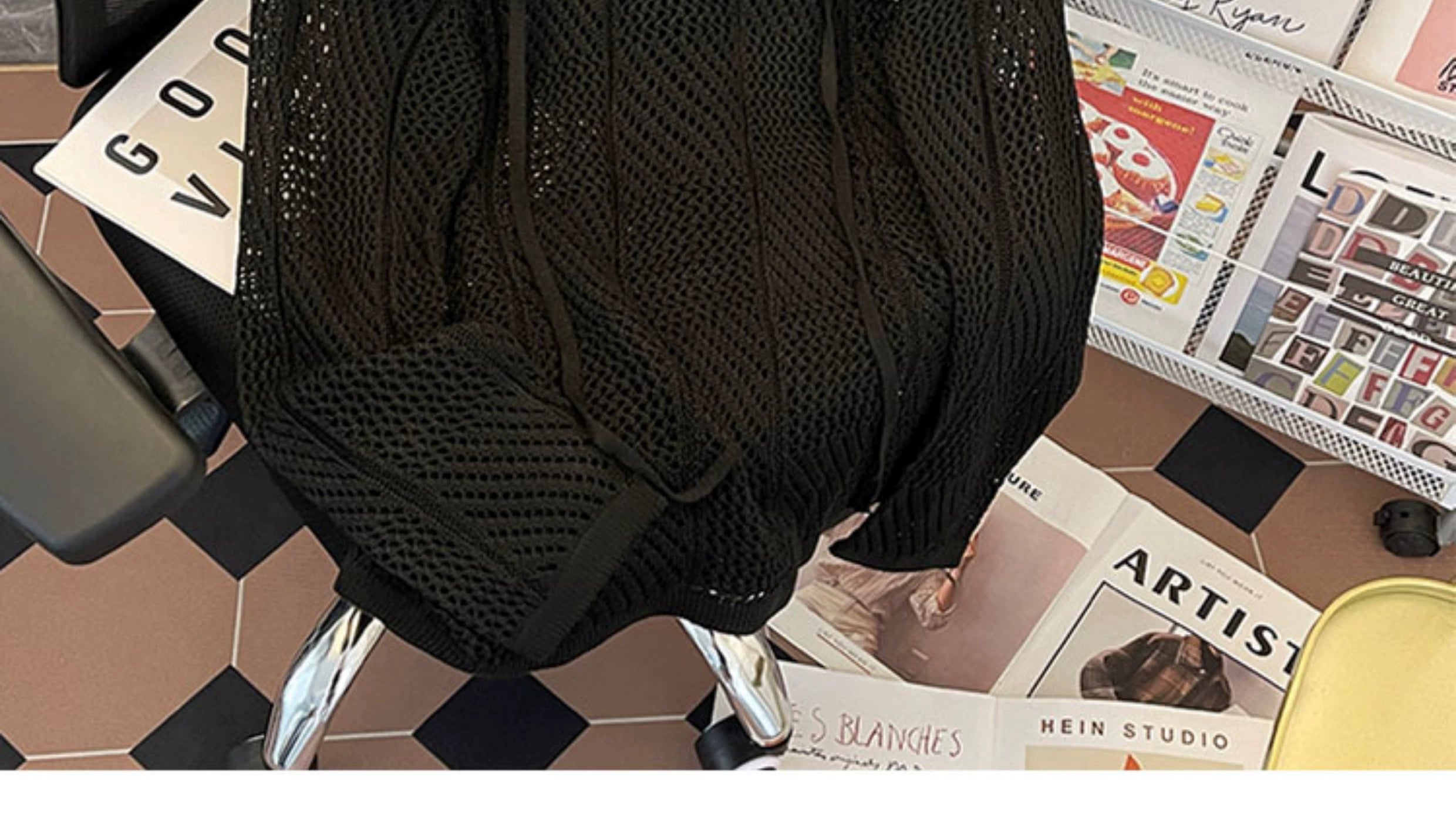 Oversized mesh knit sweater with a drawstring neckline