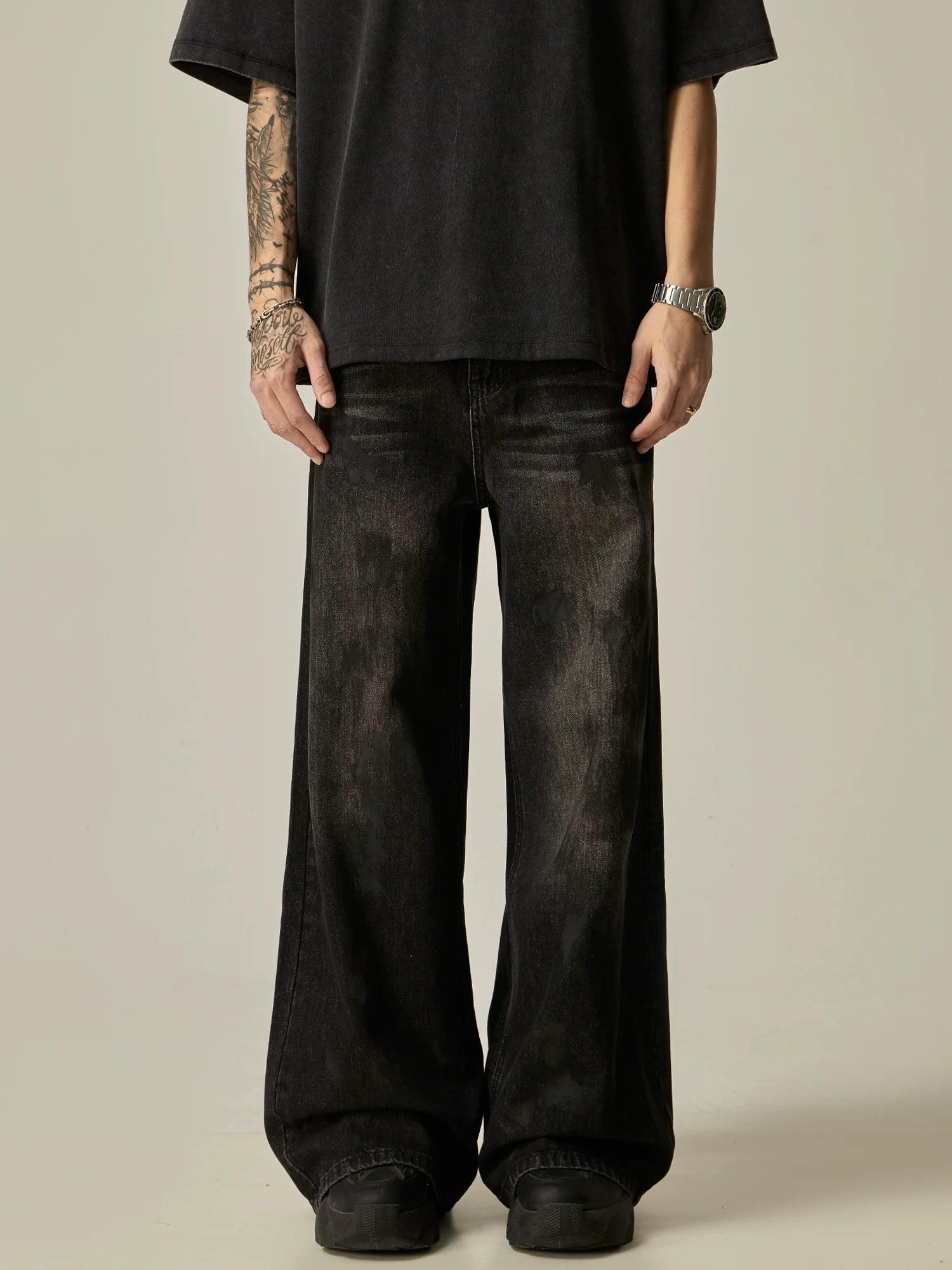 Wide-Leg Distressed Black Denim Jeans